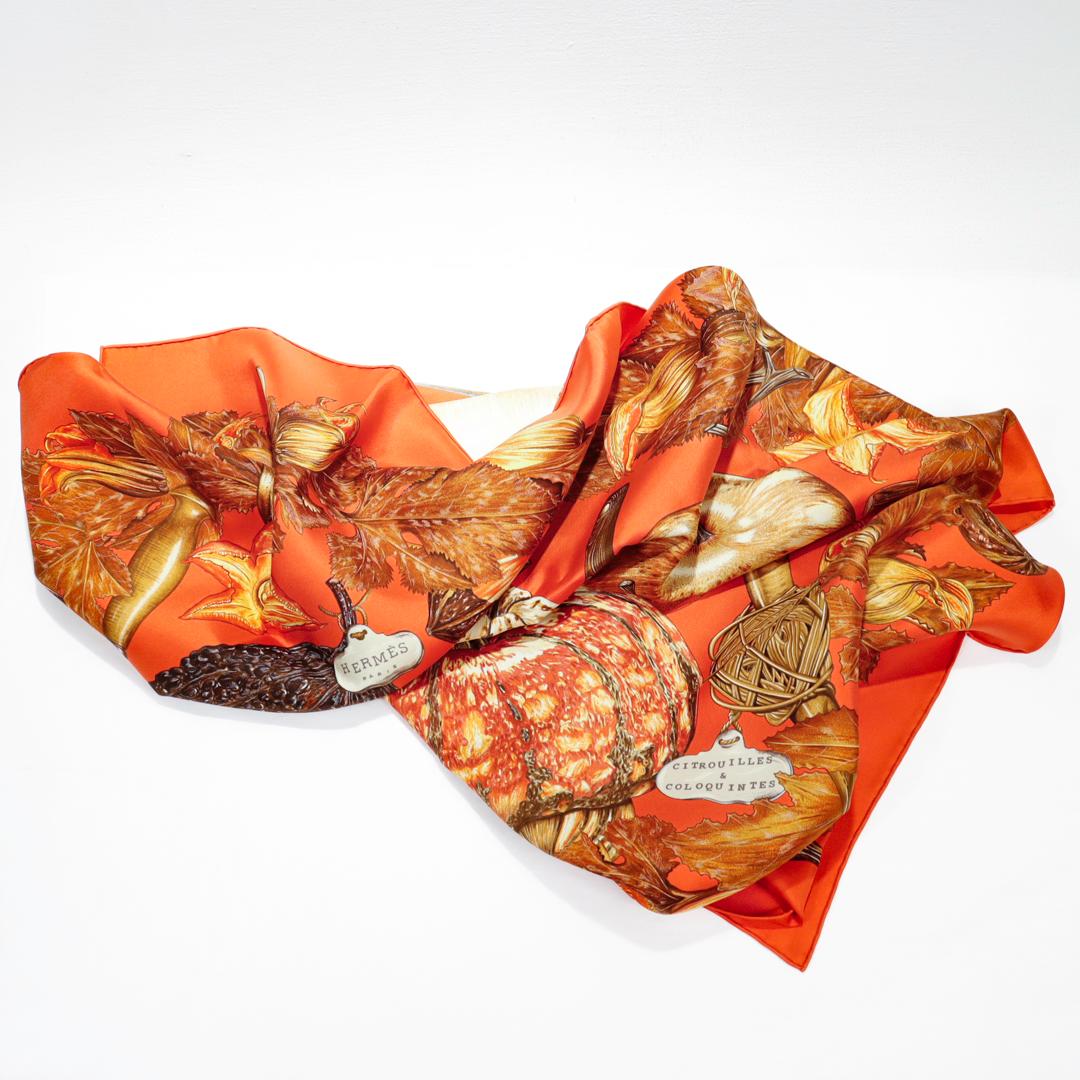 A fine vintage silk scarf.

By Hermes.

Decorated with pumpkins & gourds and gardening tools. 

With a hand rolled edge and a 