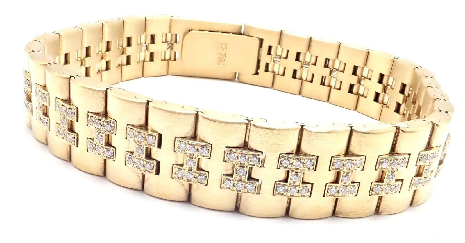 18k Yellow Gold Diamond H Link Vintage Bracelet by Hermes.
With 196 Round Brilliant cut diamonds VS1 clarity,  E color total weight approximately 1ct
Details:
Length: 7