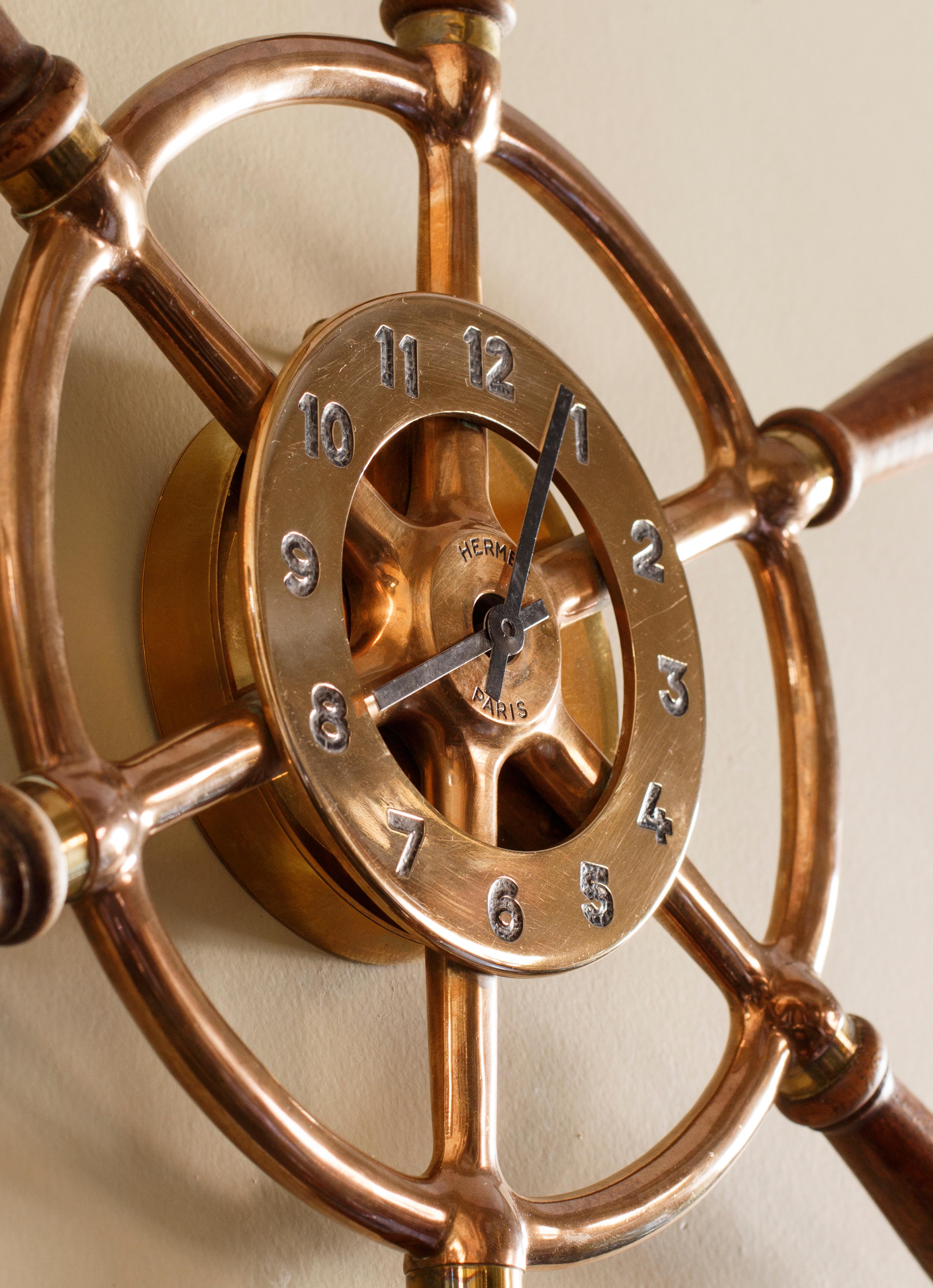 Rare and original vintage Hermes Paris “Gouvernail” ship’s wheel wall clock. The clock encases an 8-day mechanical movement, made probably by Jaeger Lecoultre (usually all Hermes clocks used JLC movements).

Hermes introduced this clock in 1940's.