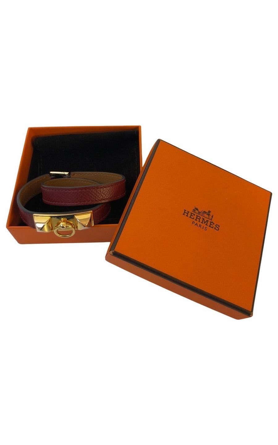 Hermès Rivale Double Tour Bracelet in red / Burgundy Epsom Leather. The bracelet has gold-plated hardware. This bracelet is perfect for everyday use. This vintage bracelet is in great condition, considering the flawless state of the leather. It