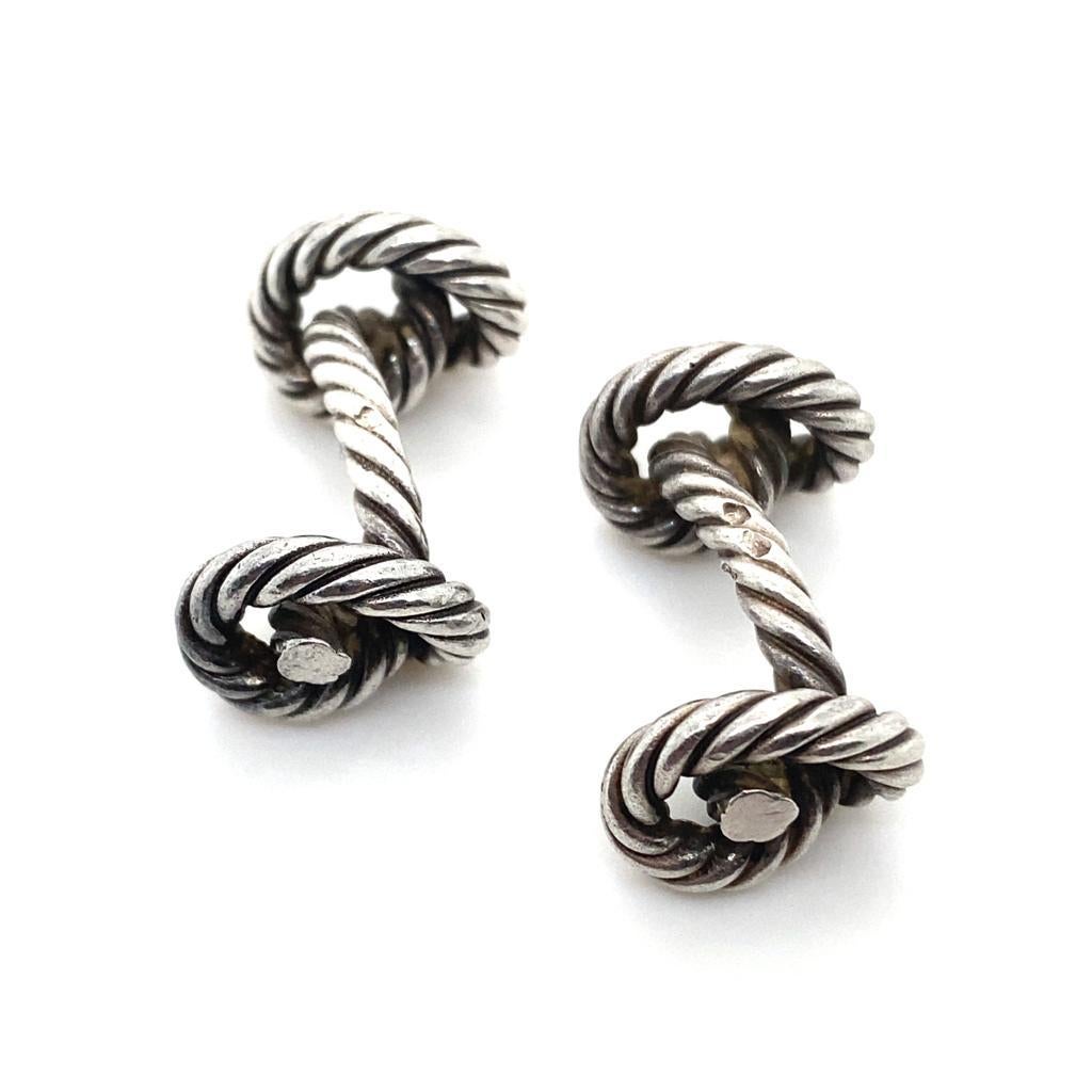 A pair of vintage Hermès silver cufflinks, circa 1950.

Each T bar cufflink is based on the twisted wire design from the Hermès Silver Sailor knot bracelet

Strong, timeless and versatile these silver cufflinks are a smart and wearable example of