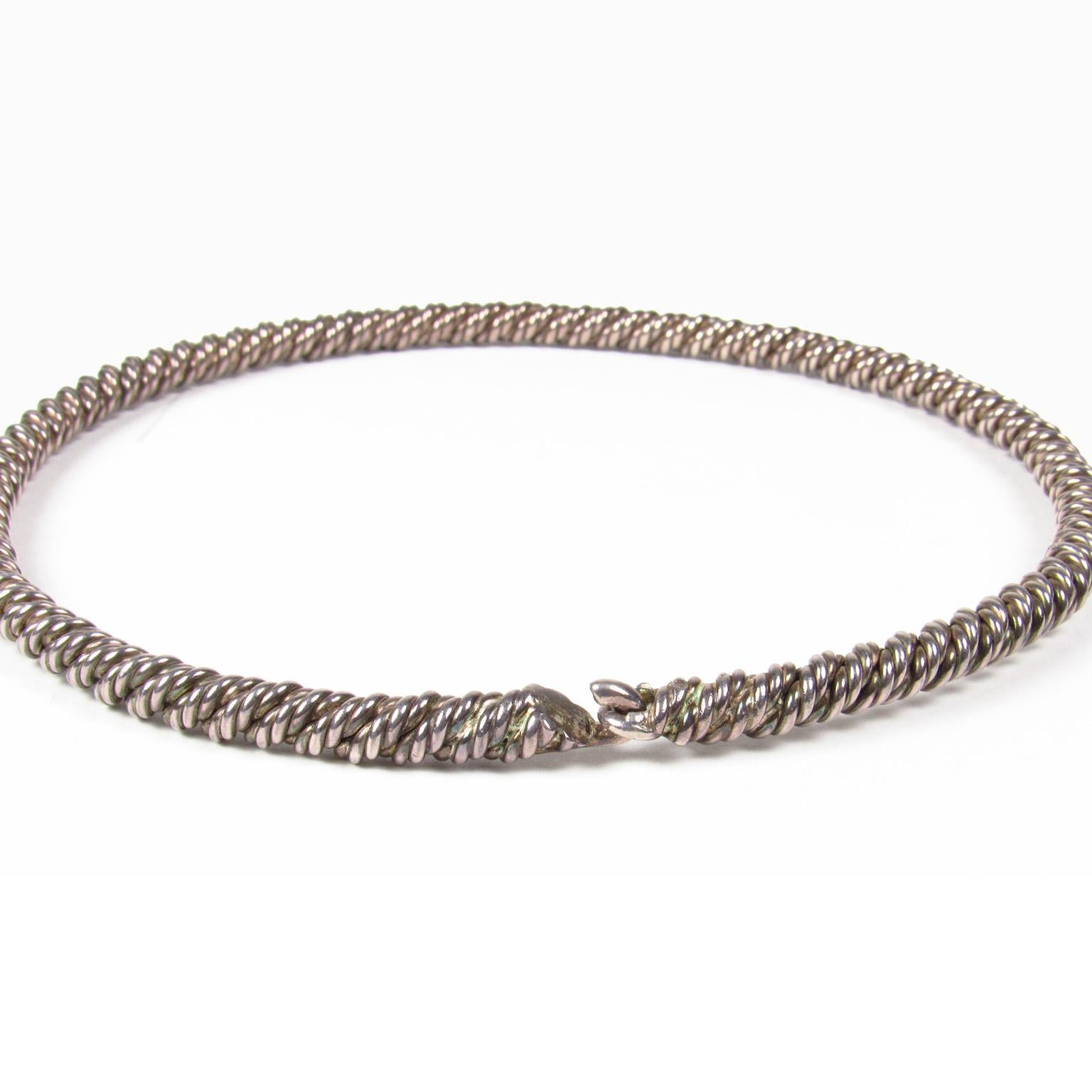 Vintage Hermes silver rope twist torque necklace. Diameter: 5 inches, width: 1/4 inches. Marked Hermès and Paris on clasp.