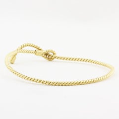 Bracelet rigide Hermès vintage en or jaune