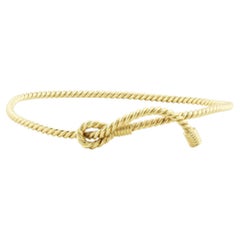 Bracelet rigide Hermès vintage en or jaune