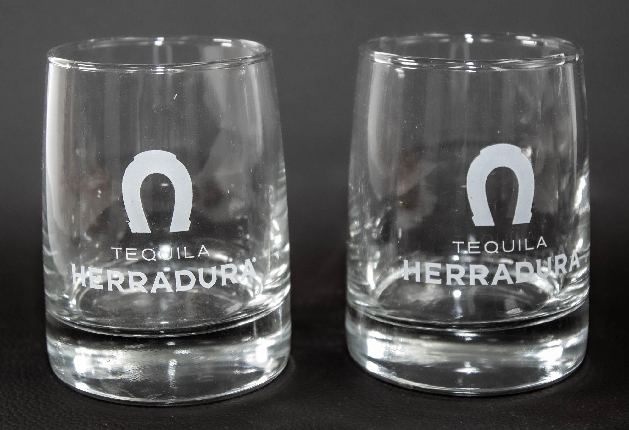 Vintage Herradura Logo Lowball tumblers Set of 4 laser engraved glasses, clear in color, with the Herradura Tequila and horseshoe logo engraved in frosted white.
Set of 4 clear low ball glasses designed for Tequila Herradura.
The glasses have a