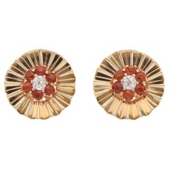 Boucles d'oreilles clip en or jaune avec grenat hessonite et diamant