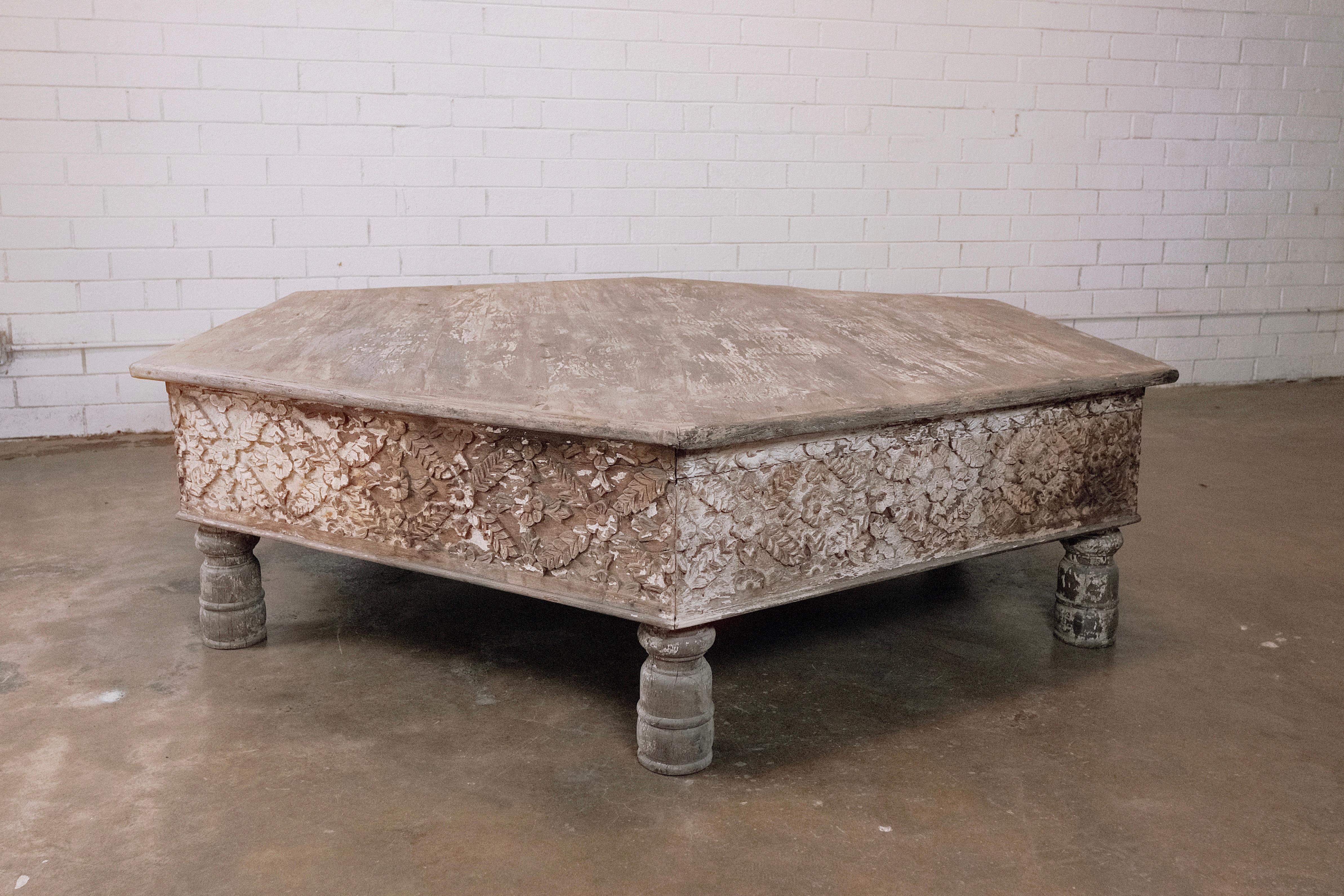 An exquisite vintage hexagonal Moorish masterpiece, this coffee table blends intricate geometric patterns with a rich patina to create a captivating centerpiece for any space. Its unique hexagonal shape adds a touch of sophistication and originality