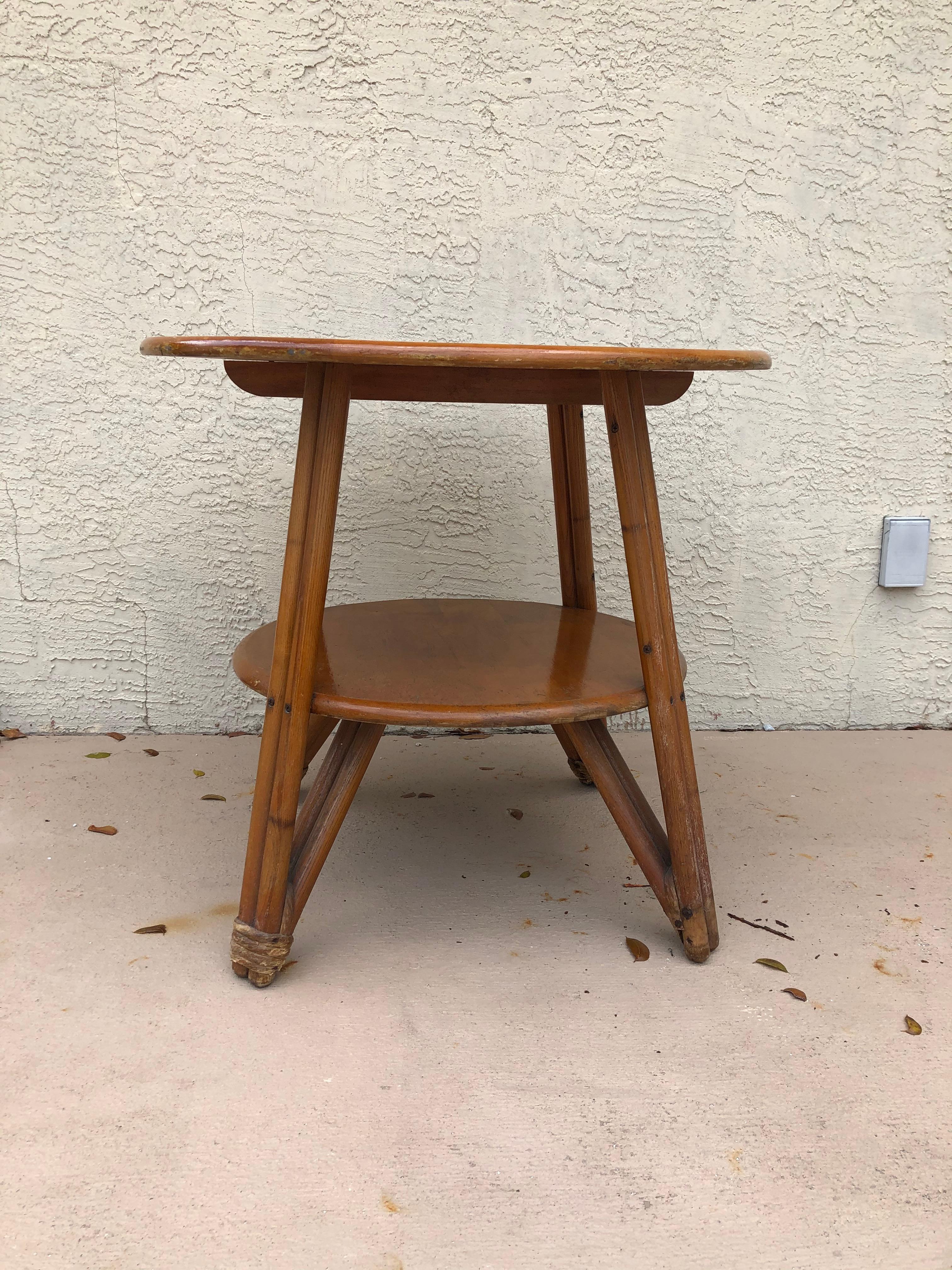 Rare rattan, bamboo and wood Heywood Wakefield game table. Probably from the 1960s. Can use for chess or checkers or whatever you desire. I could not find another example online. Condition overall is good except one bottom leg is missing wrapped