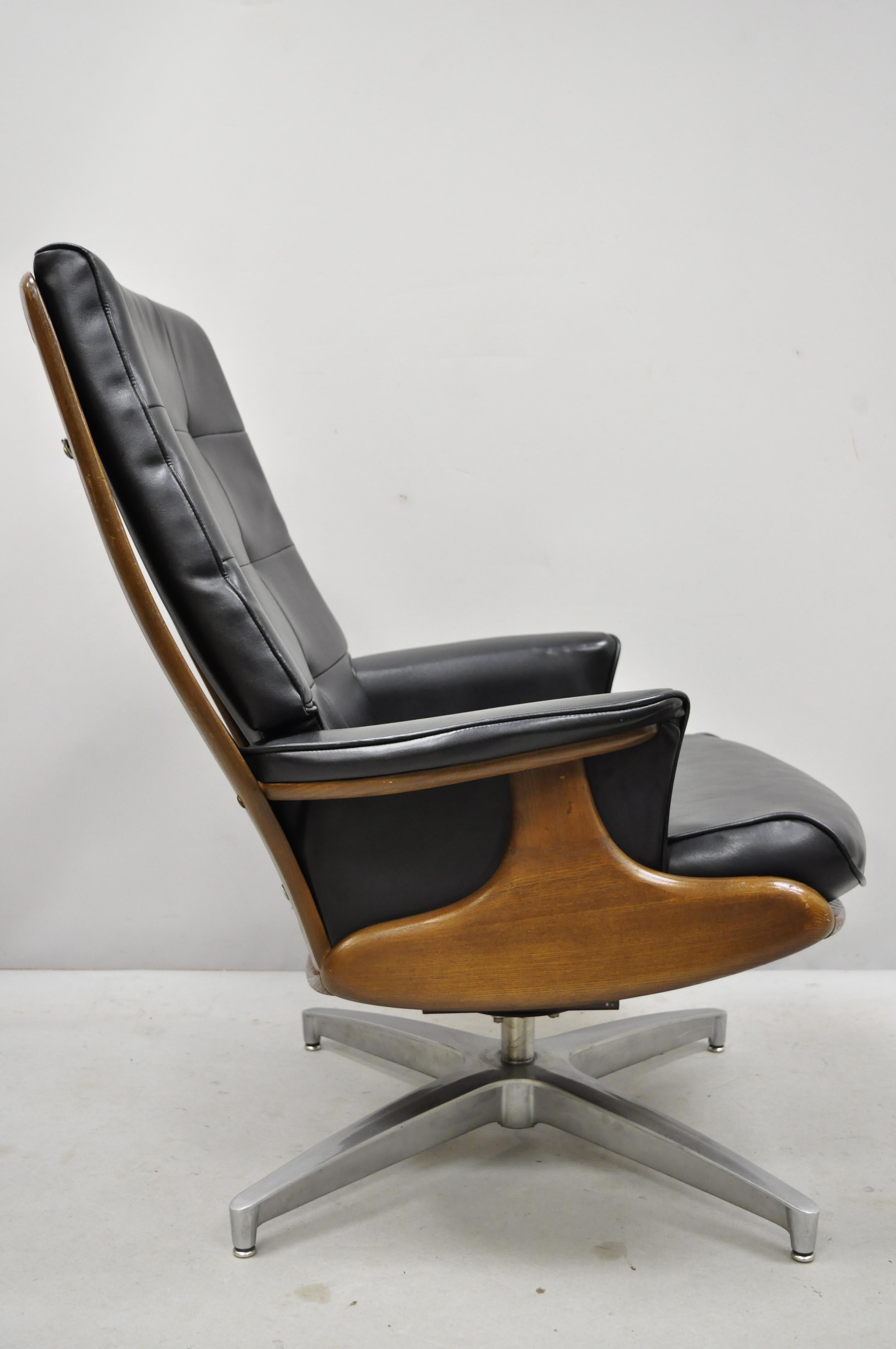 Vintage Heywood Wakefield Teak and Black Vinyl Swivel Tilt Lounge Armchair 1