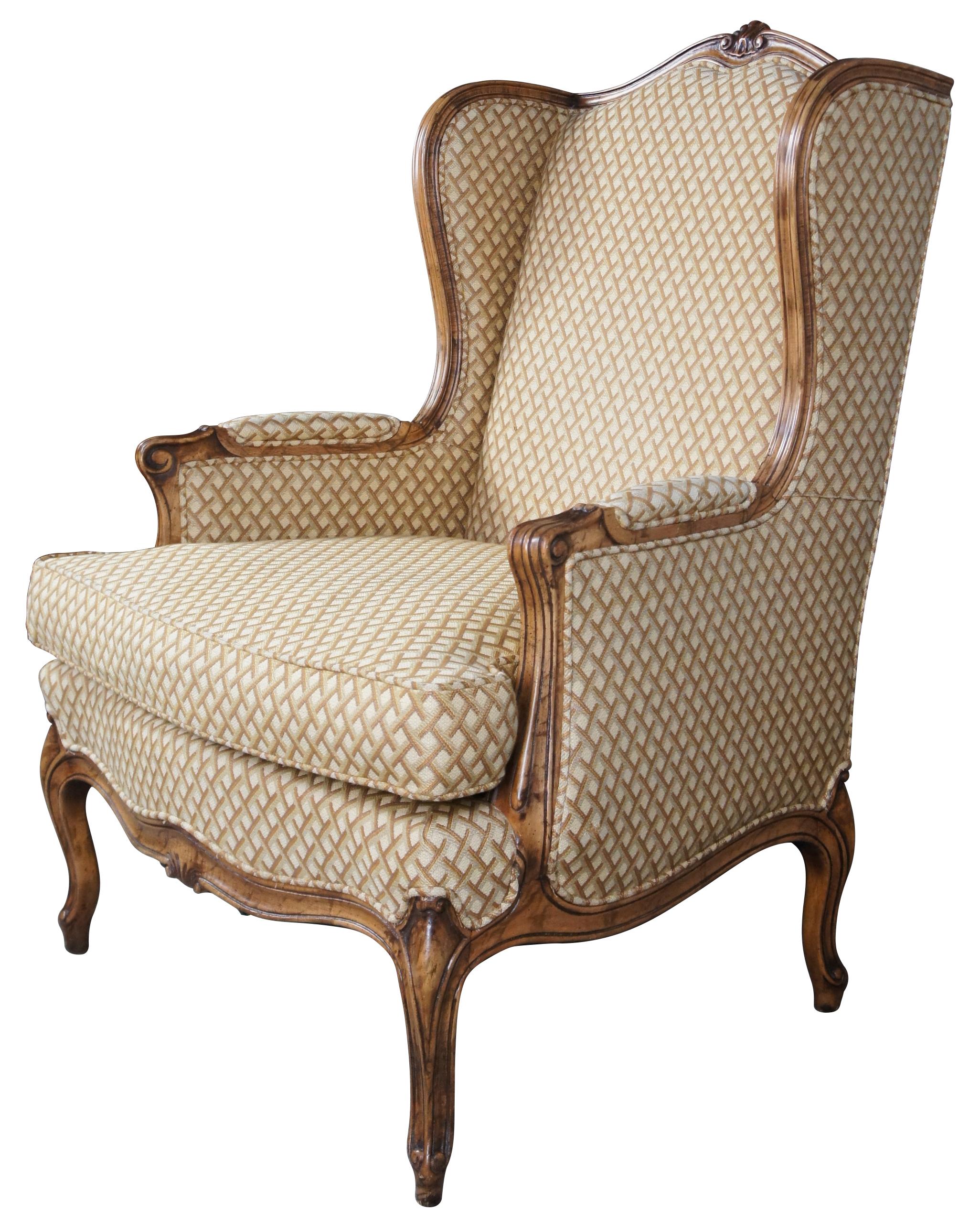Hickory Chair Collectors Mix Wingback Arm Chair, circa 1960s. Style no 5012-25

Made from walnut with a cognac finish upholstered in Mauve & Brown Lattice pattern fabric.  An elegant contoured shape with scalloped accents, padded scrolled arms and