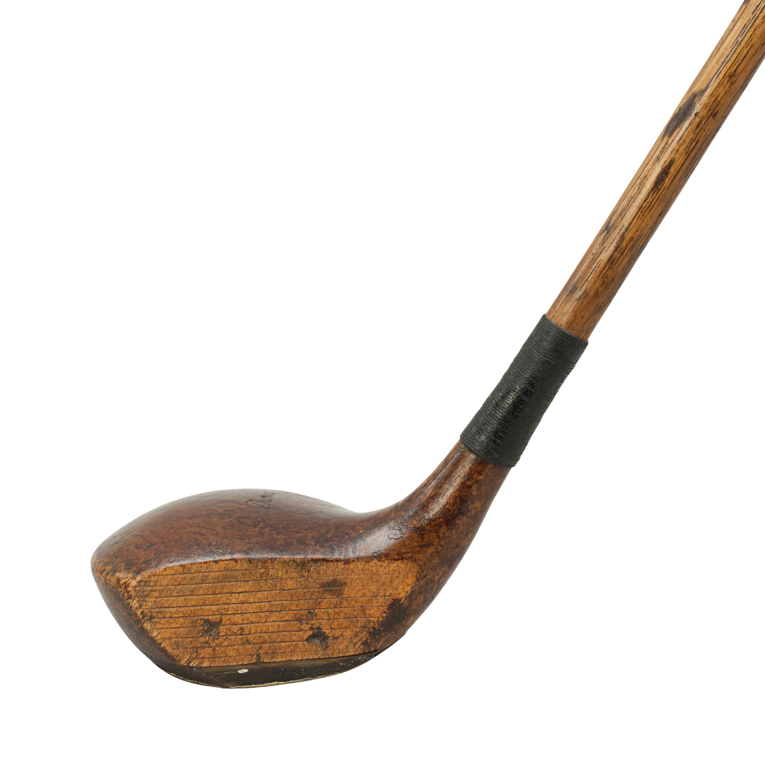 Golf Club, Hickory Gibson Brassie, George Duncan.
A good persimmon wood brassie by Gibson of Kinghorn, Fife. The club has a hickory shaft with a faint Gibson 'Star' stamped into it with a suede leather grip. The head is marked with 'Geo Duncan'