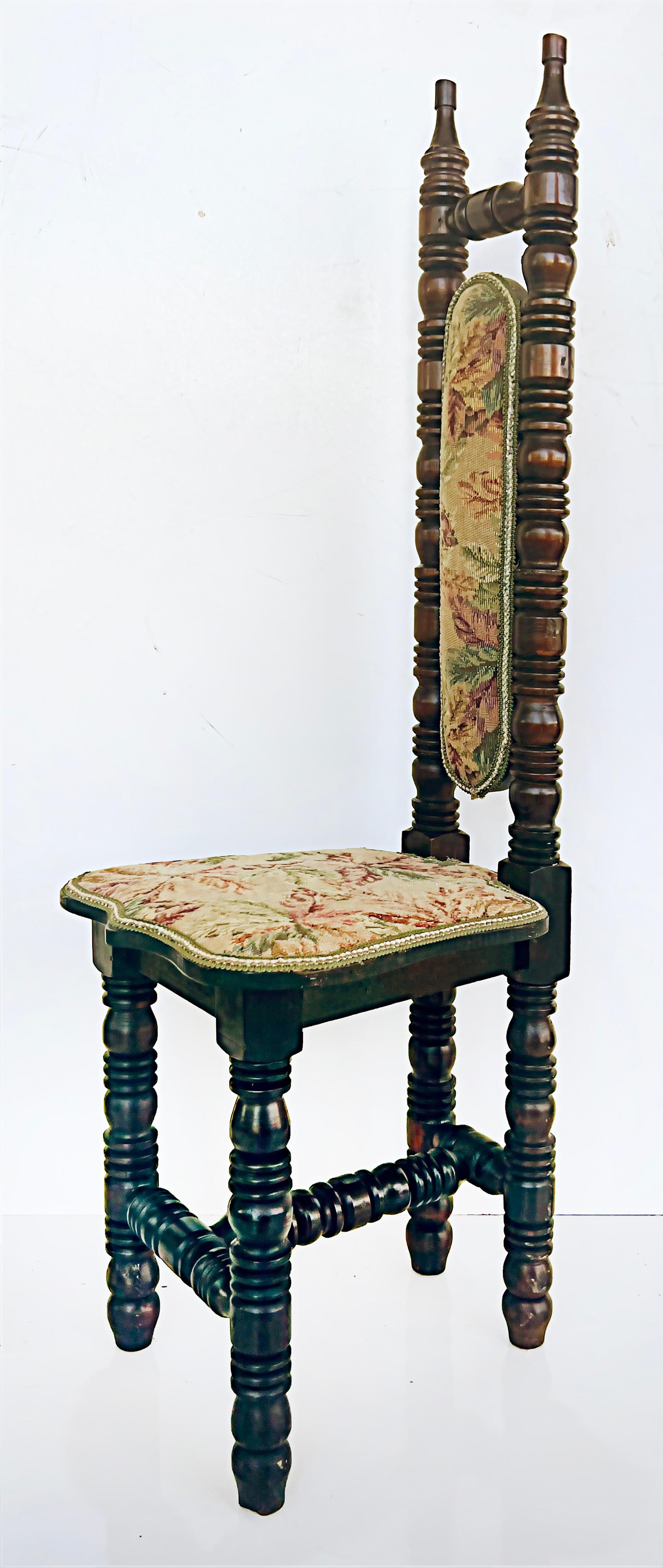 Vintage high back Jacobean style Spanish hall prayer chairs, pair

Offered for sale is a 20th-century vintage pair of high back Jacobean style Spanish hall prayer chairs with needlepoint upholstered seats and backs. The chairs are crafted with