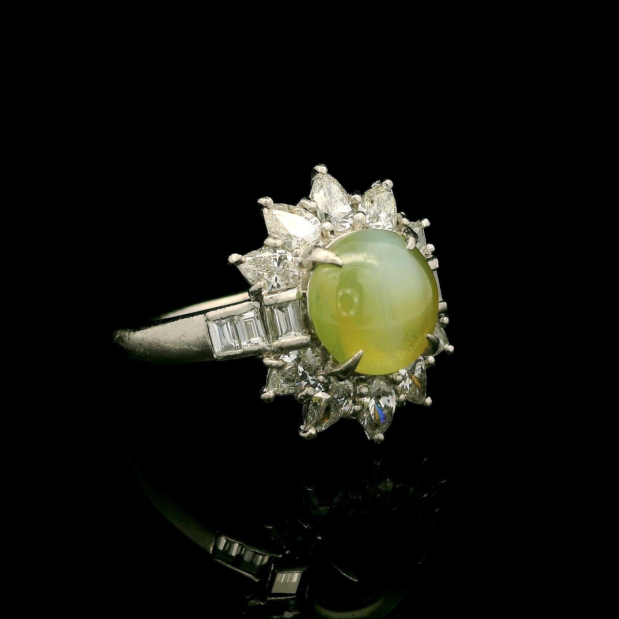 --Stone(s):--
(1) Natural Genuine Cat's Eye - Round Double Cabochon Cut - Prong Set - Yellowish Green Color - 3.10ct (exact - stamped)
** See Certification Details Below for Complete Info **
(26) Natural Genuine Diamonds - 10 Pear & 6 Baguette Cut -