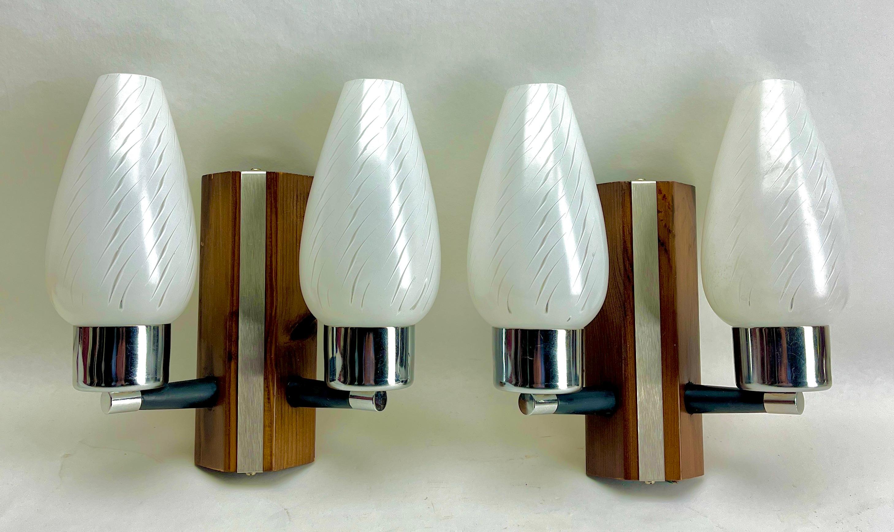 Vintage 2 arm pair of wall mount lamps, the 1960s.
Hillebrand Germany.
Factory in light fixtures was founded by Egon Hillebrand in 1881, who was originally a foliage grower and installer. 
The factory was located in Neheim, Germany Mohnestrasse.

In