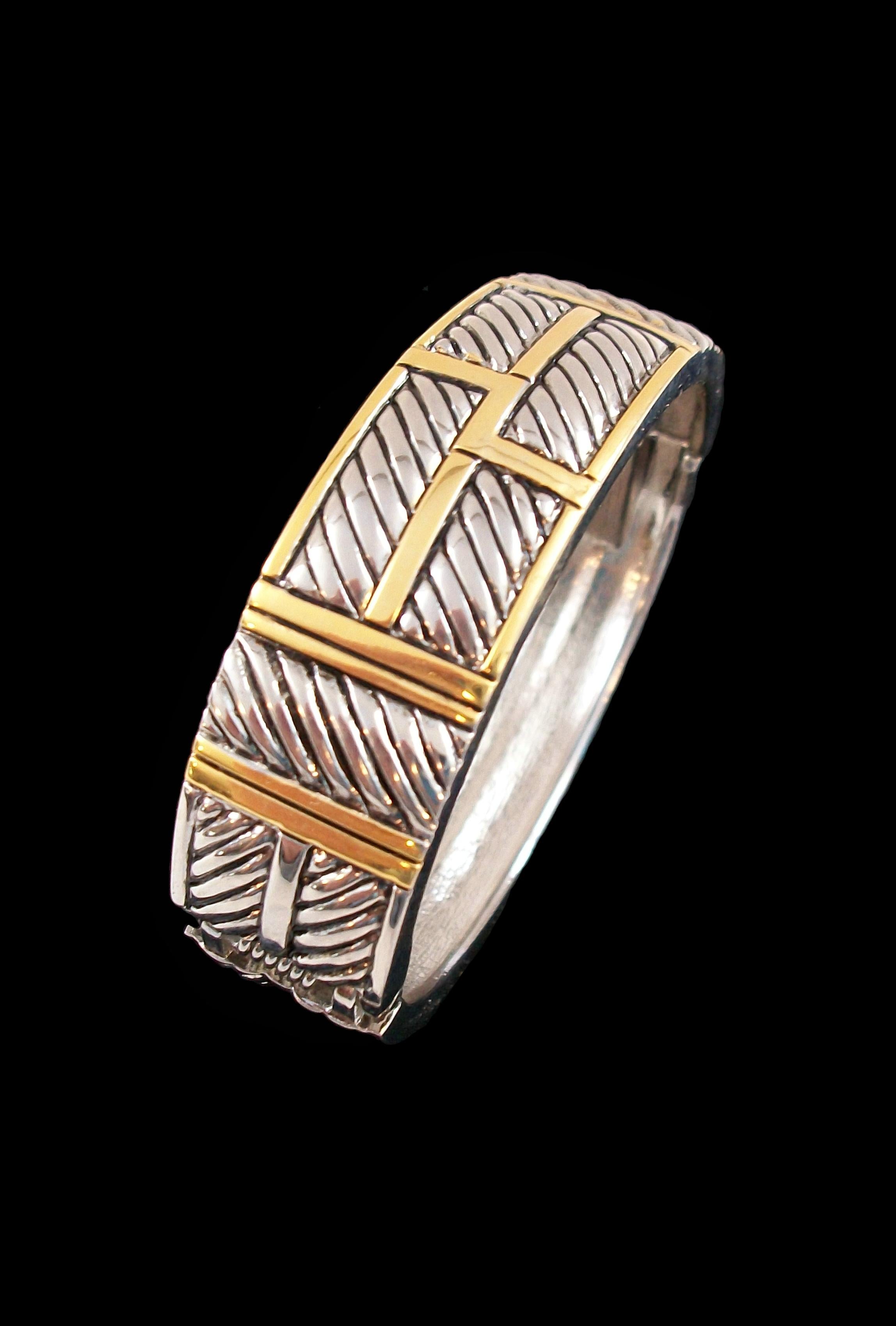 Vintage two tone metal bracelet - hinged clamper bangle design with twisted rope detail - unsigned - circa 1980's.

Excellent vintage condition - minor surface scratches to the metal from age and use - no loss - no damage - no repairs - ready to