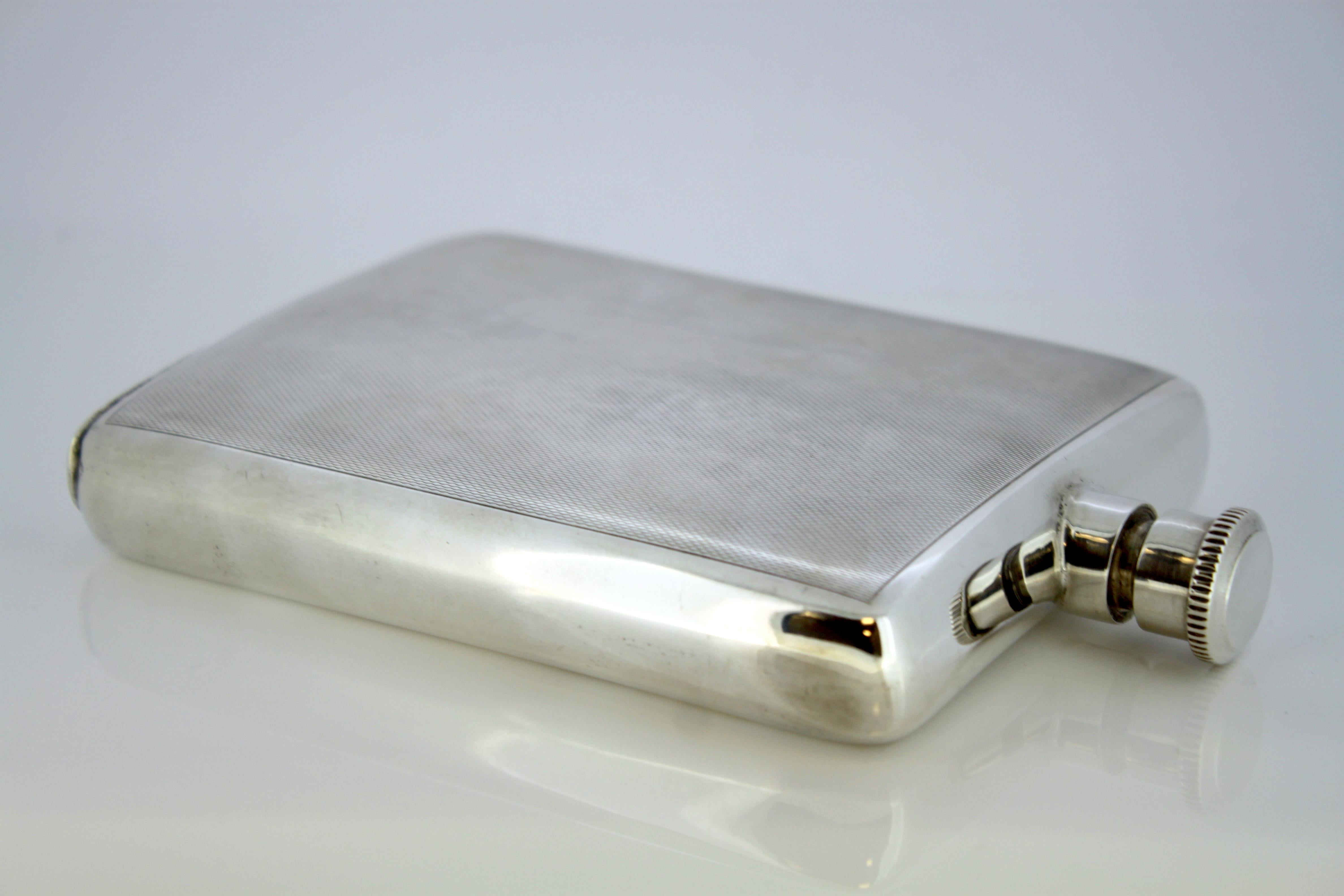 Vintage silver hip flask

Made in England, Birmingham, 1971
Maker: Charles S Green & Co.
Fully Hallmarked.

Dimensions:
Size
10 x 2 x 14.5 cm
Total weight 205 g

Condition: General used, age related wear, otherwise excellent condition,