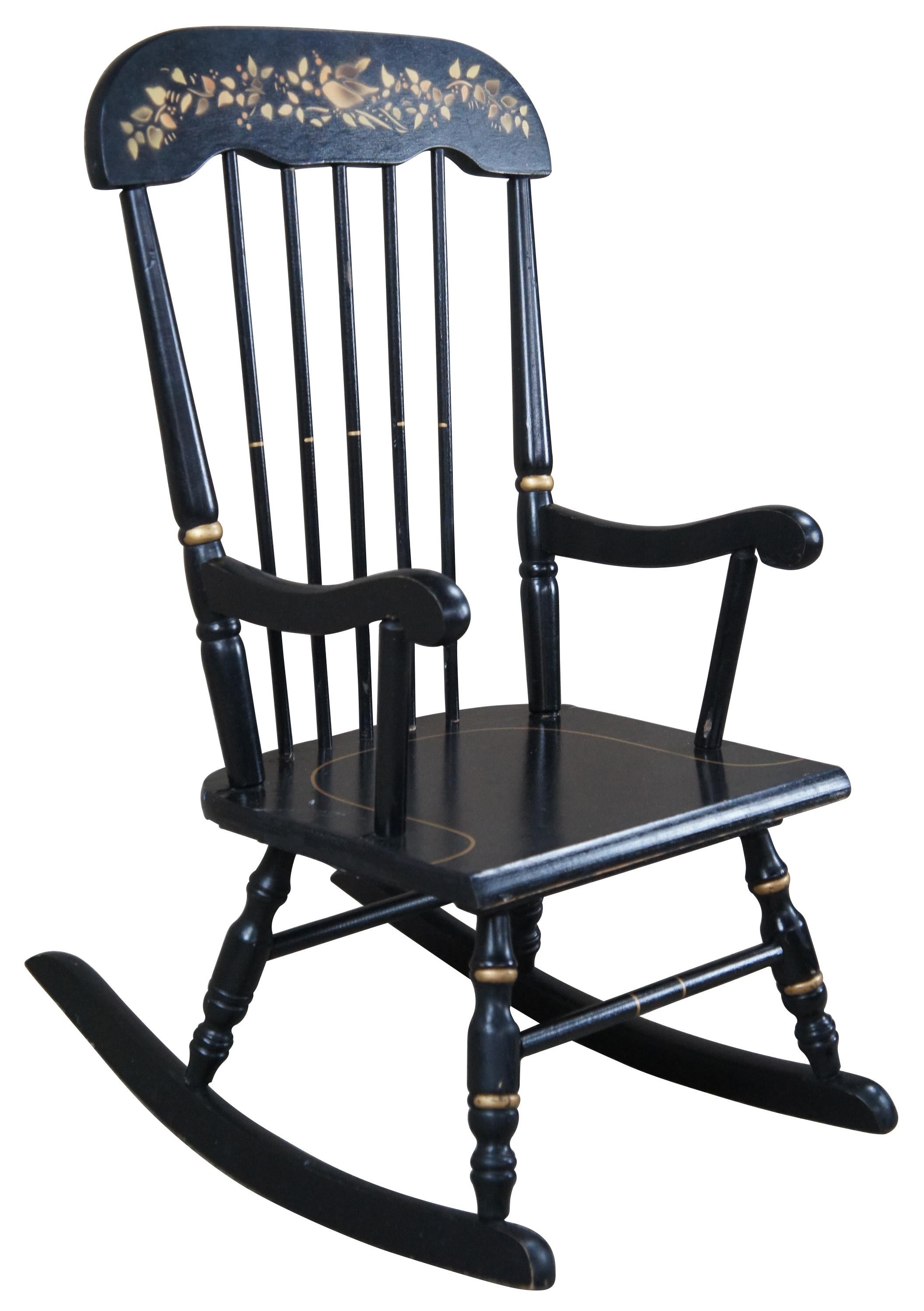 Vintage Hitchcock or Boston style spindle back children's rocking chair. Black with gold trim and stenciled back.