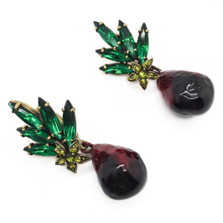 A fabulous vintage Hobe Brooch & Earrings. Featuring a stunning combination of stones. Including emerald green marquise and lime green stones leading to the dramatic contrast of the red enamel pear shaped drops. The lustrous red enamel is a stunning