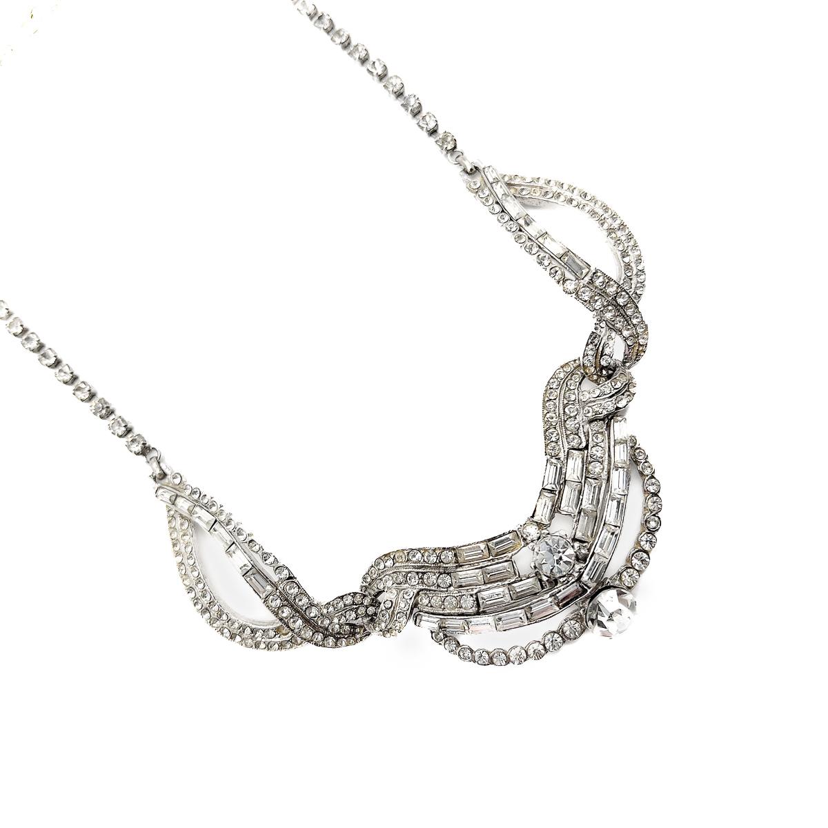 A Vintage Hollywood Deco Paste Necklace. Sublime cocktail style and a forever piece of mid century heritage.
A British costume jewellery company, Hollywood was founded over a century ago in 1918. Necklaces and art deco inspired designs are amongst