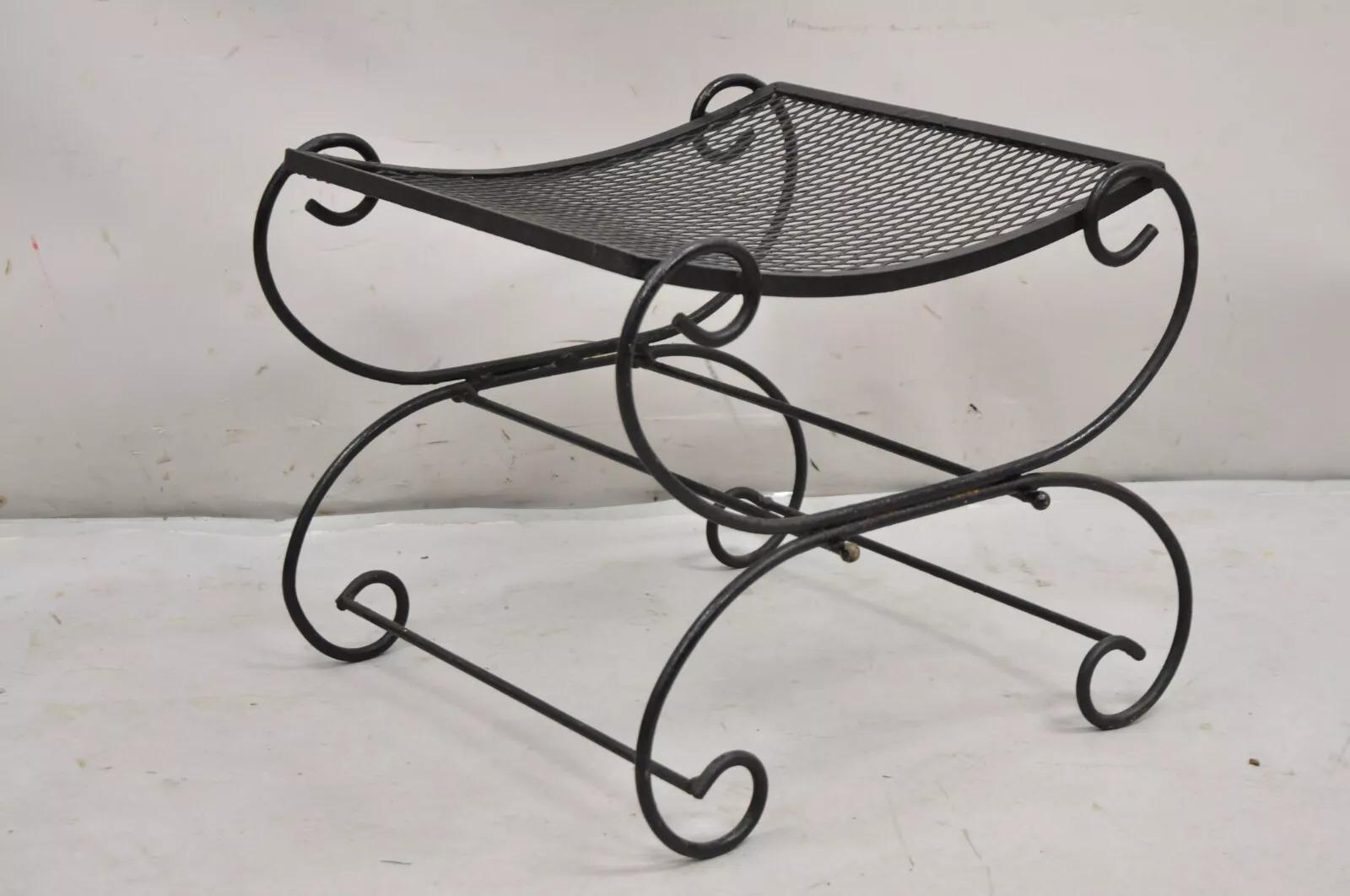 Vintage Hollywood Regency Black Wrought Iron Curule Scrolling Bench. Circa Mid 20th Century. Dimensions : 15