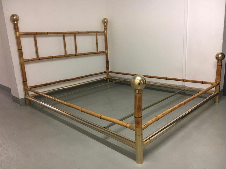 Impressive vintage Hollywood Regency brass and bamboo bed, circa 1970s
Very good condition.
Size: 200 x 165 cm
Fit for a matress of 190 x 150 cm
Height of headboard 122 cm
Easily dismountable for shipping
Strong and heavy brass frame.