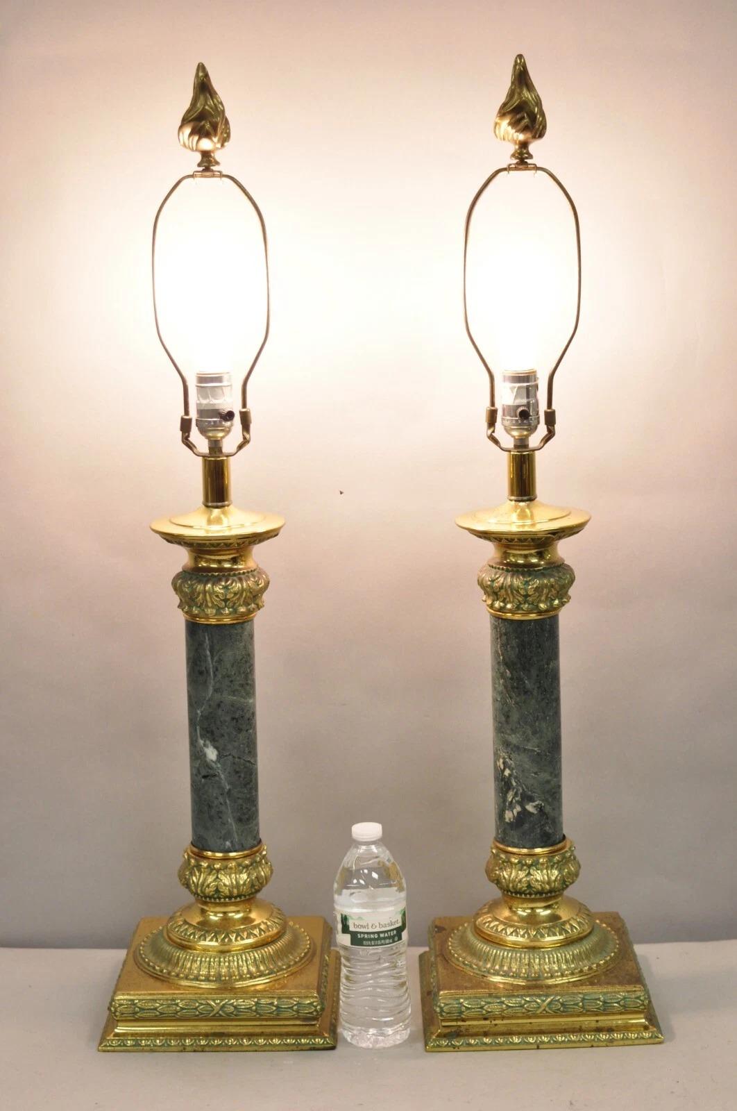 Vintage Hollywood Regency Brass Empire Green Acrylic Column Gold Table Lamps by Crystal Clear Ind. - Pair. Item features acrylic faux marble shafts with green green painted details. Circa Late 20th Century. Measurements: 35