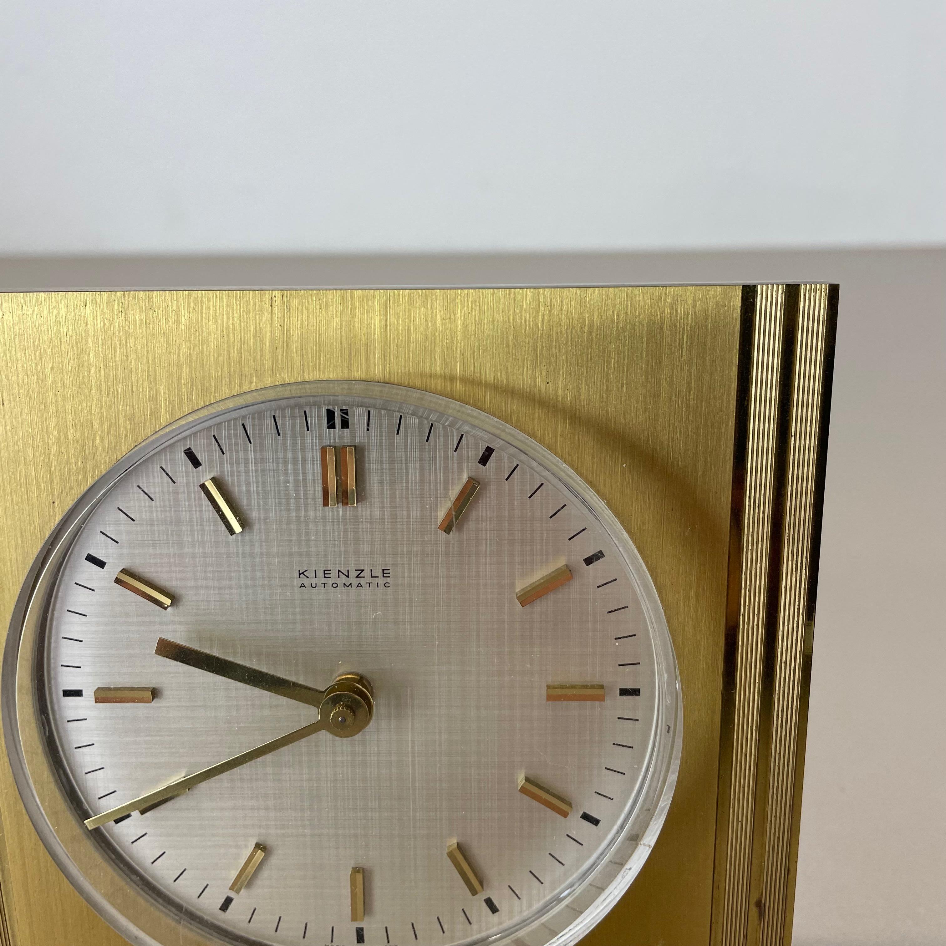 Metal Vintage Hollywood Regency Brass Glass Table Clock by Kienzle, Germany 1960s For Sale