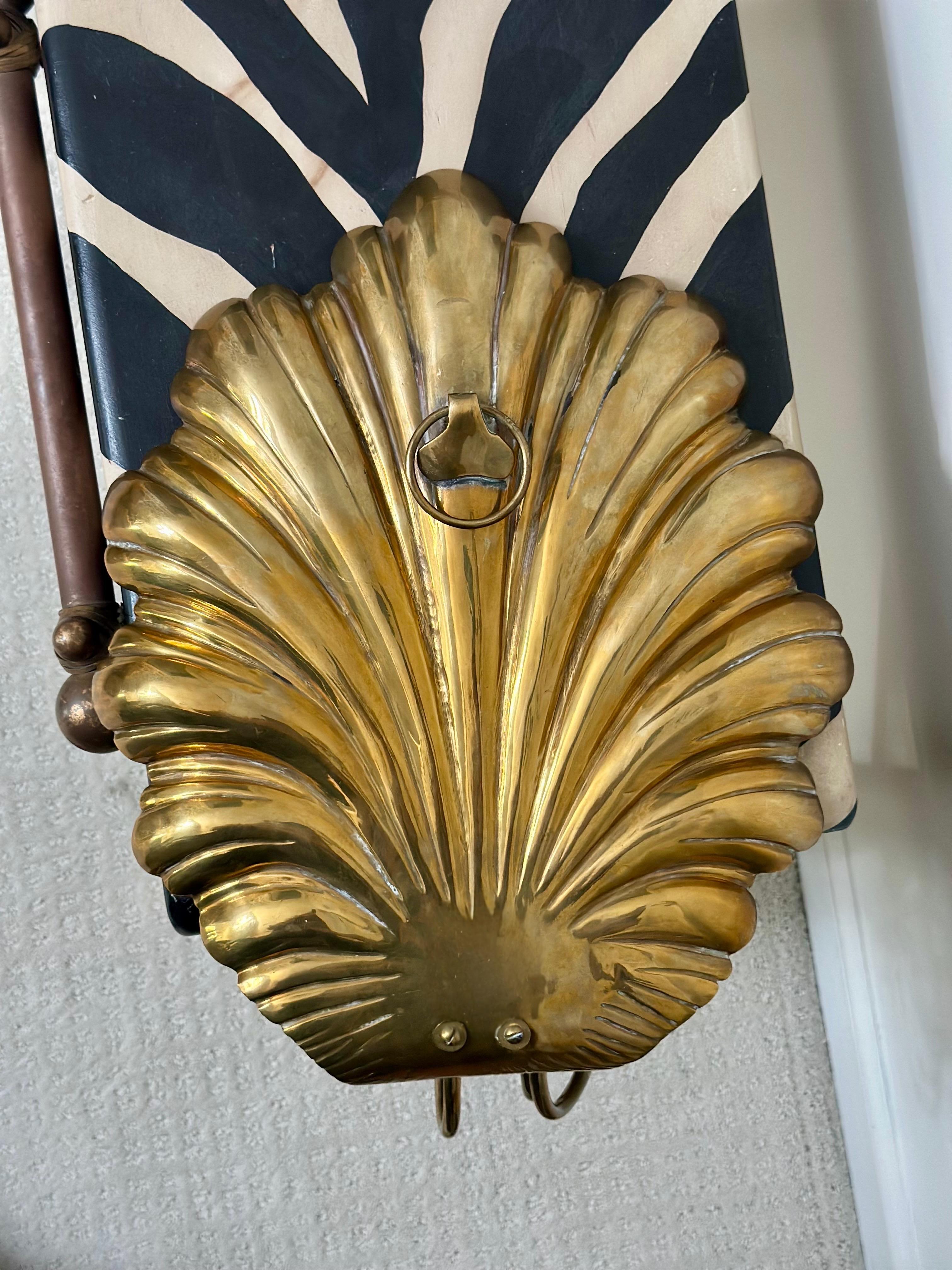 Vintage Hollywood Regency Brass Shell Back Three-Arm Wall Sconces - a Pair In Good Condition For Sale In Farmington Hills, MI