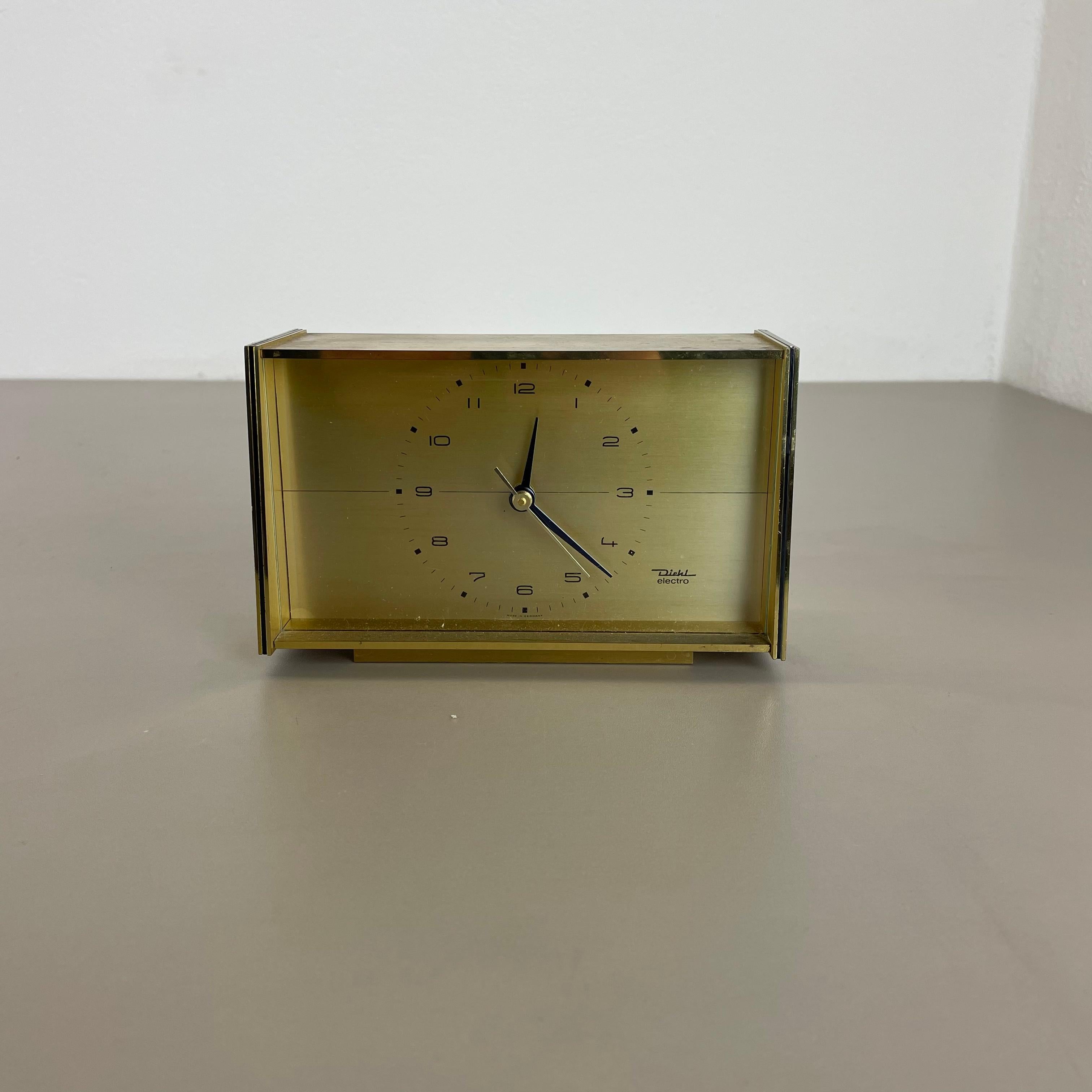 Article:

Table clock



Origin:

Germany


Producer:

Diehl Electro, Germany


Age:

1960s



This original vintage table clock was produced in the 1960s by the premium clock producer Diehl in Germany. The clock is original