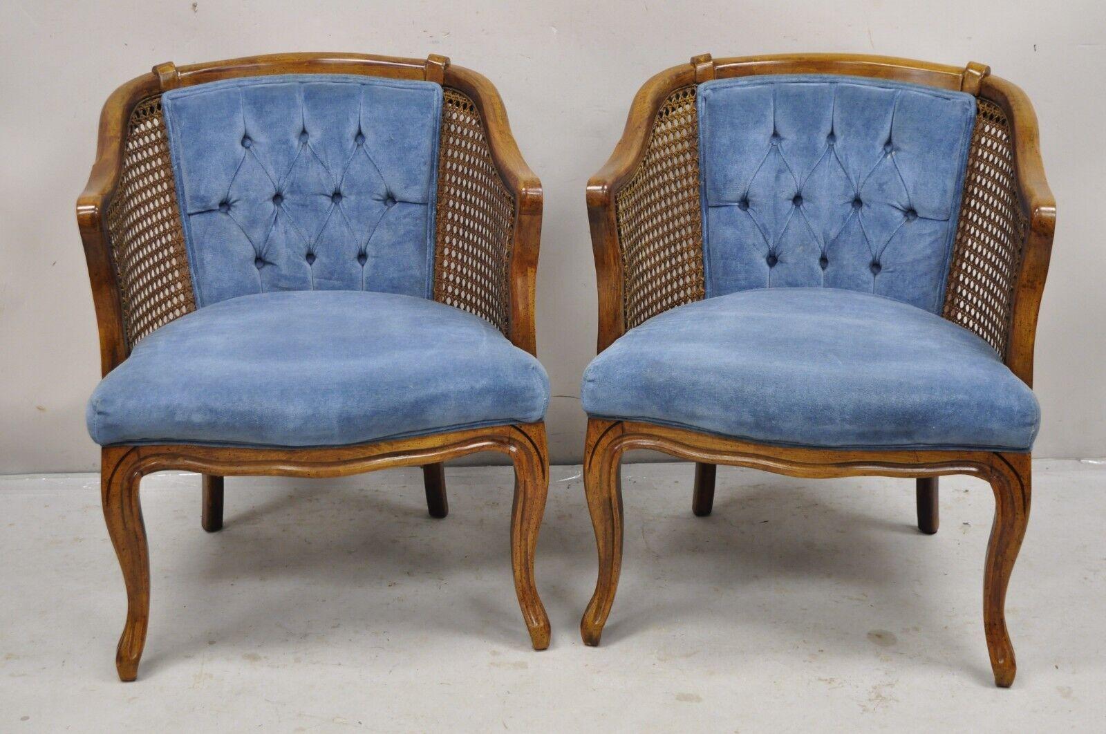 Vintage Hollywood Regency Cane Side Barrel Back Blue Cushion Club Lounge Chairs - a Pair. Circa Mid to Late 20th Century. Measurements: 31