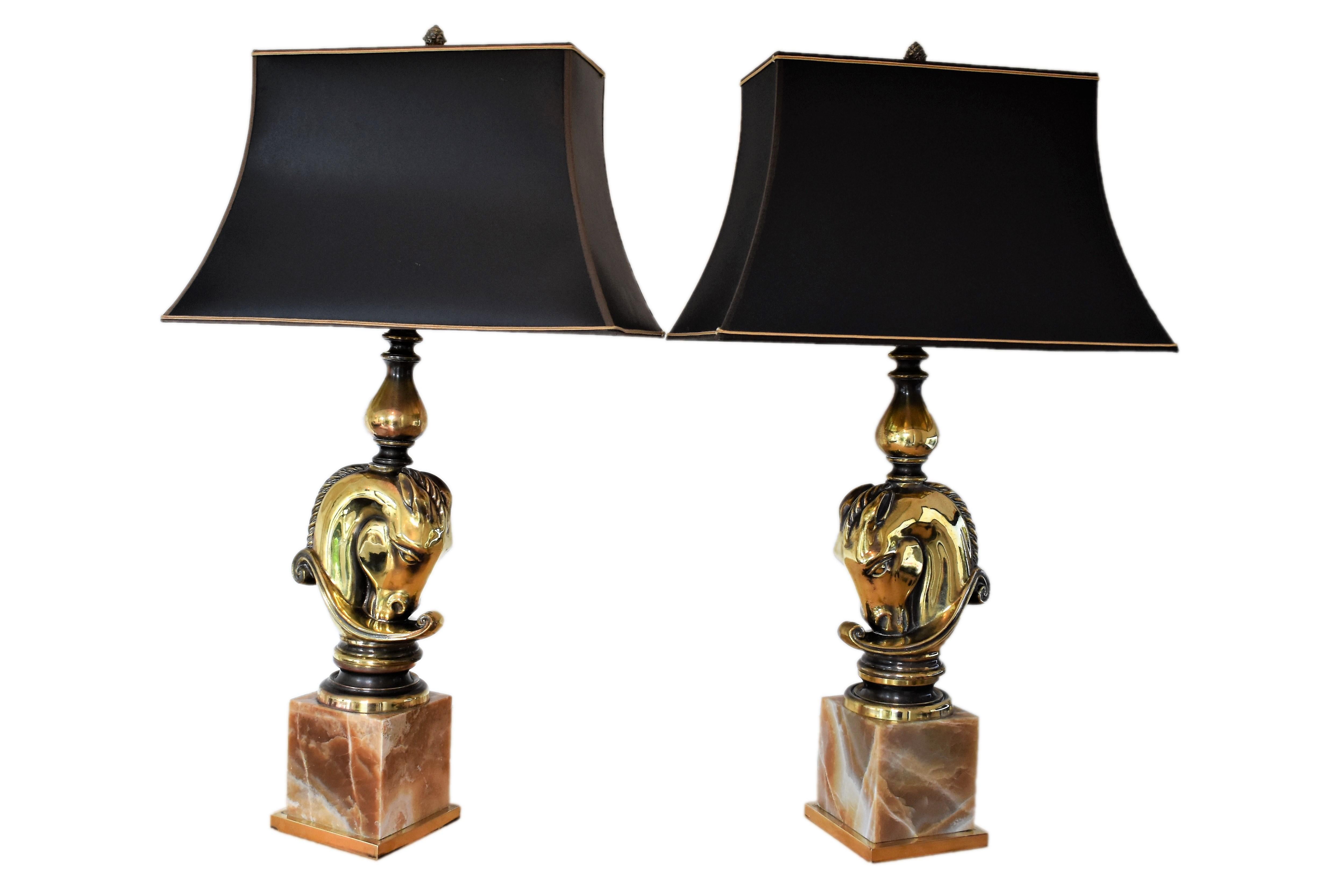 A beautiful pair of large horsehead table lamps made from bronze and onyx marble bases by Maison Charles.
The shades are not part of the sale. 

The lamps will be wired for your country.