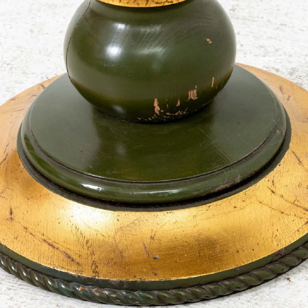 Vintage Hollywood Regency Circular Green Painted and Gilt Table. Can be used as a great little cocktail or side table. Super chic, one of a kind custom table. Original finish. Has some wear to painted finish on base as well as slight wear on top to