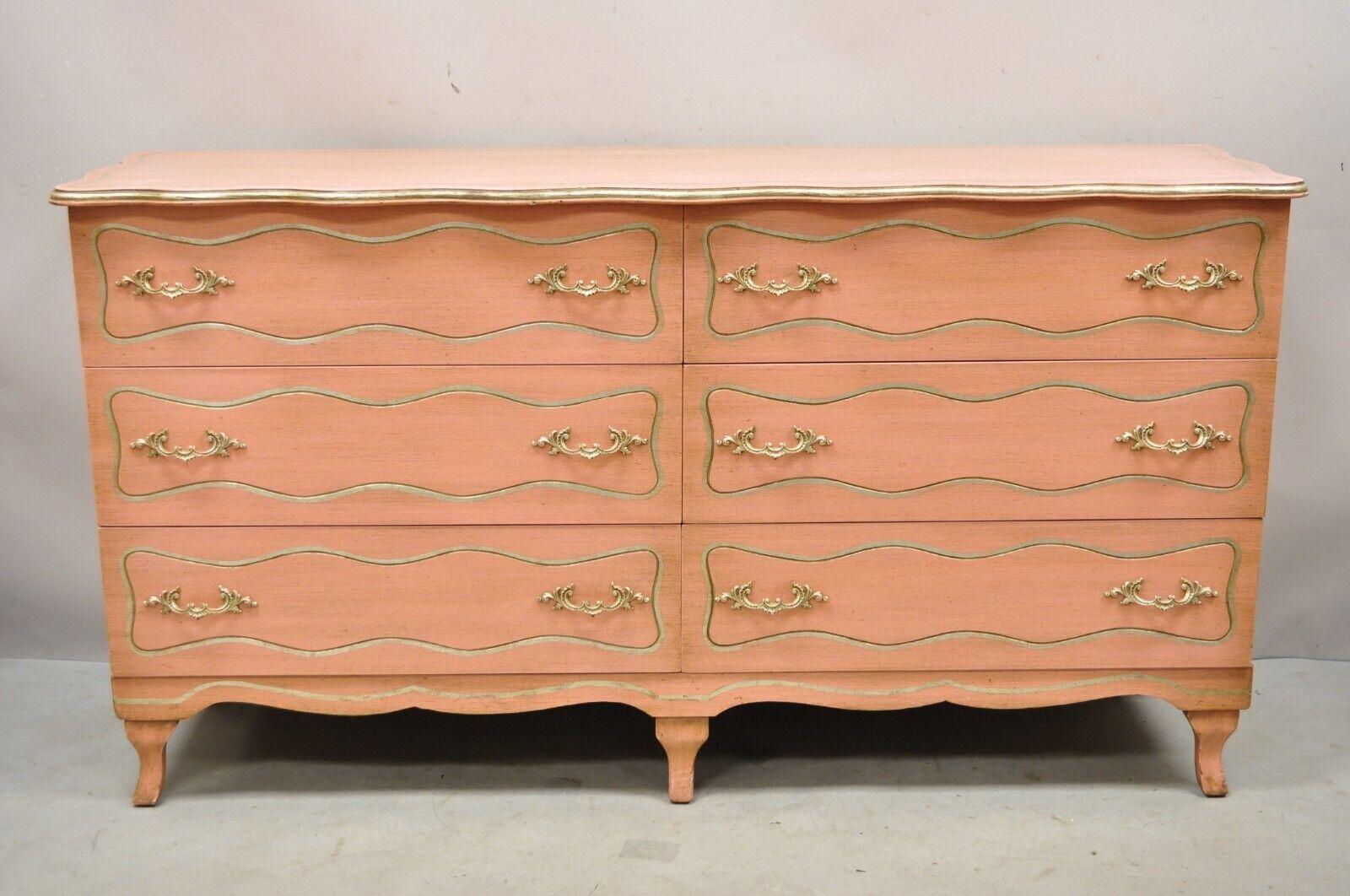 Vintage Hollywood Regency Dorothy Draper Style Bubblegum Pink 6 Drawer Dresser. Item features a bubblegum pink custom vintage finish, silver painted accents, serpentine top, 6 drawers, very nice vintage item, quality American craftsmanship, great