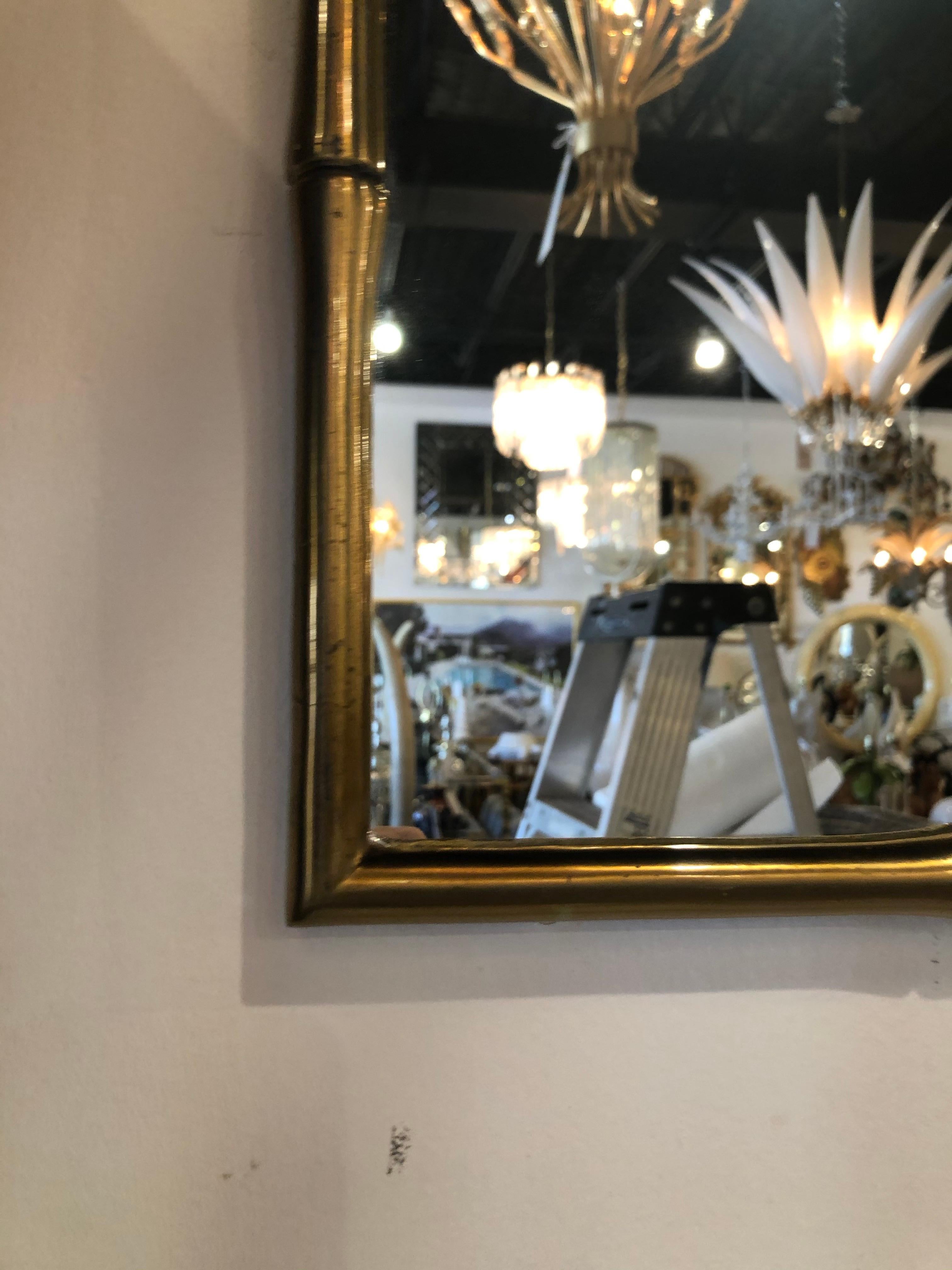Lovely vintage Italian 1950s faux bamboo solid brass wall mirror. Ready to hang. Heavy, solid brass. Made in Italy. 