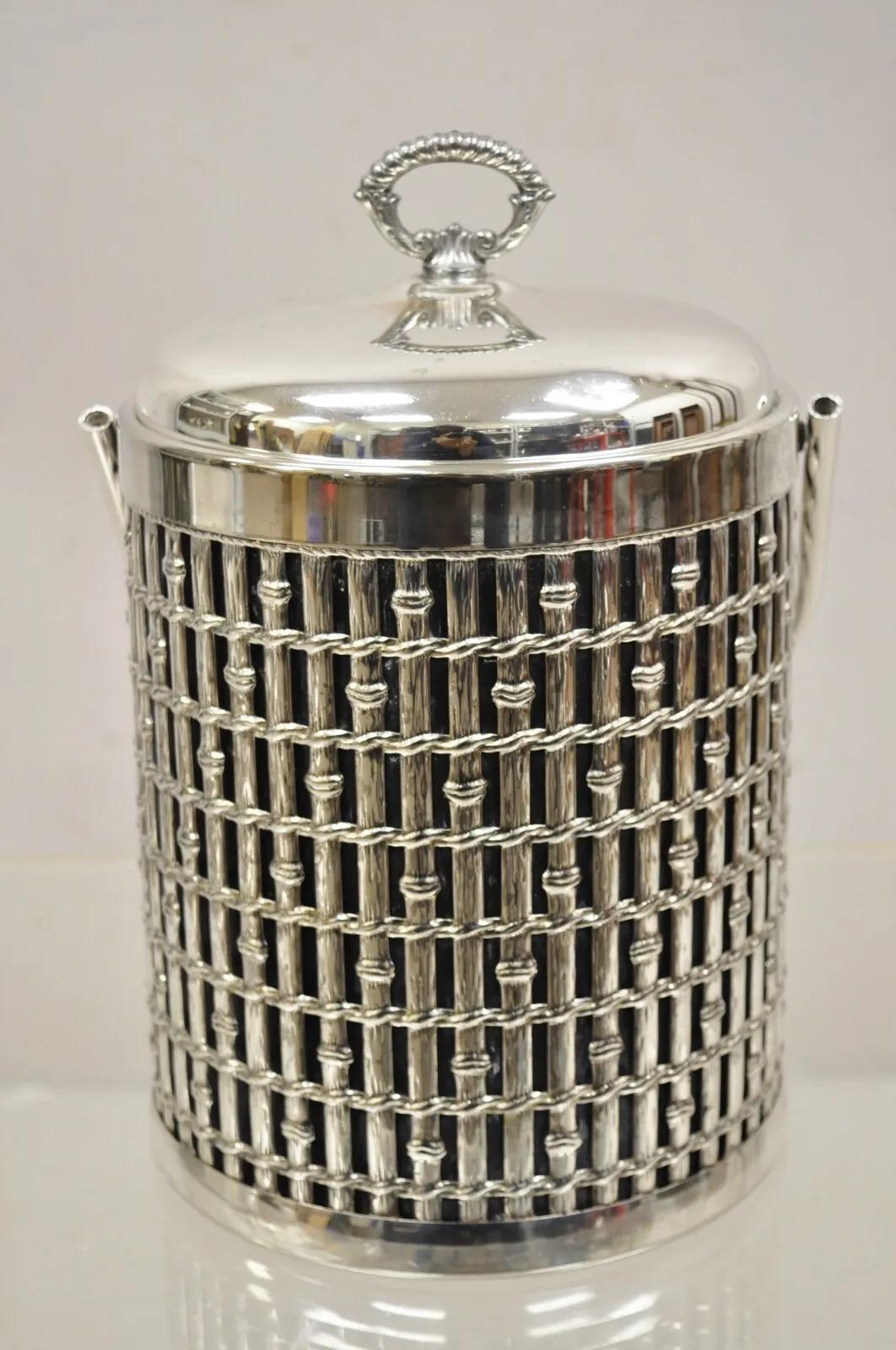 Vintage Hollywood Regency Faux Bamboo Silver Plated Lidded Ice Bucket. Circa Late 20th Century. Measurements: 12