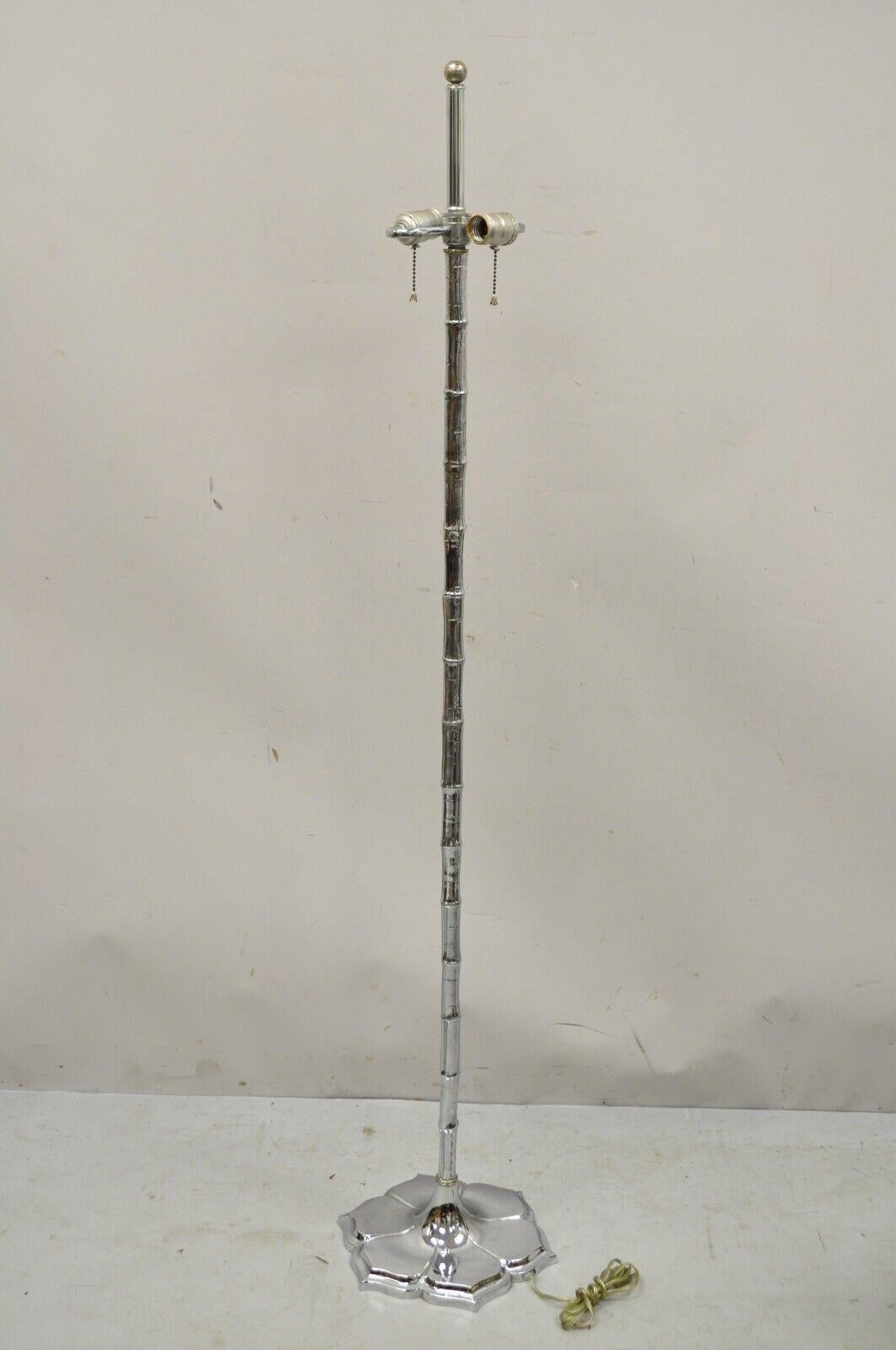 Vintage Hollywood Regency Faux Bois Faux bamboo chrome lotus floor lamp. item features faux Bois/faux bamboo shaft, Lotus base, silvered finish, very nice vintage item, great style and form. Circa Mid 20th Century. Measurements: 57.5