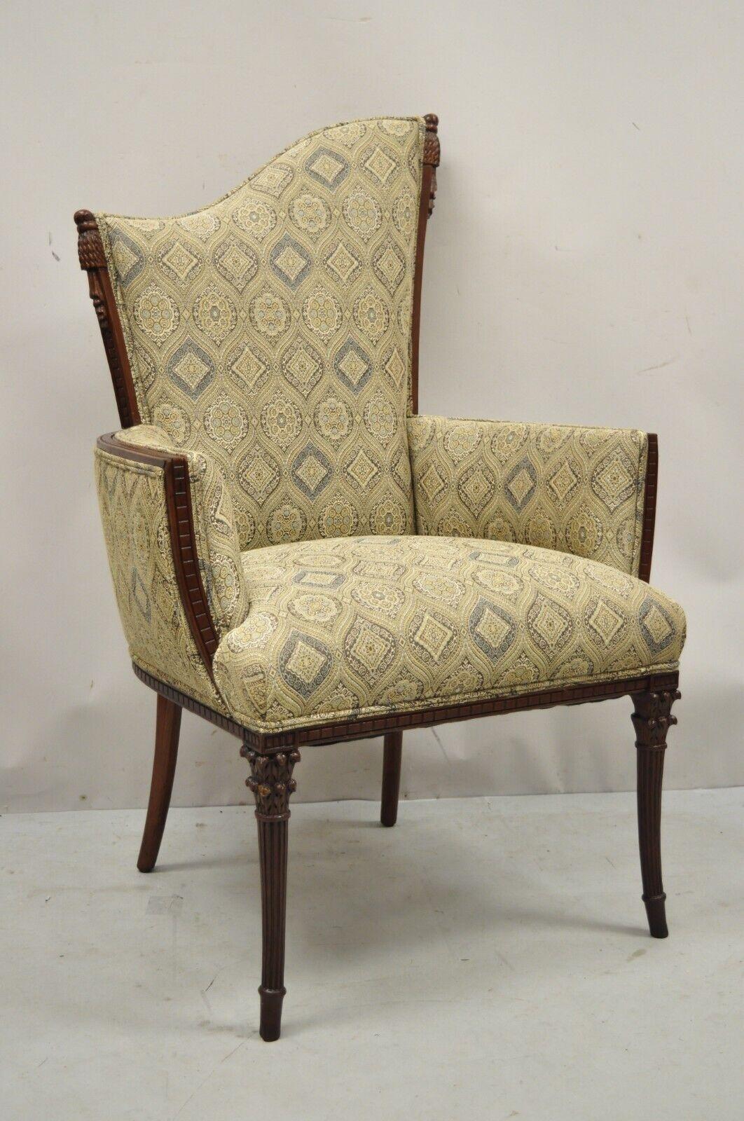 Vintage Hollywood Regency French style angled back mahogany fireside lounge chair. Item should be reupholstered, current fabric has cat smell. Item features a solid wood frame, nicely carved details, tapered legs, great style and form. Circa early