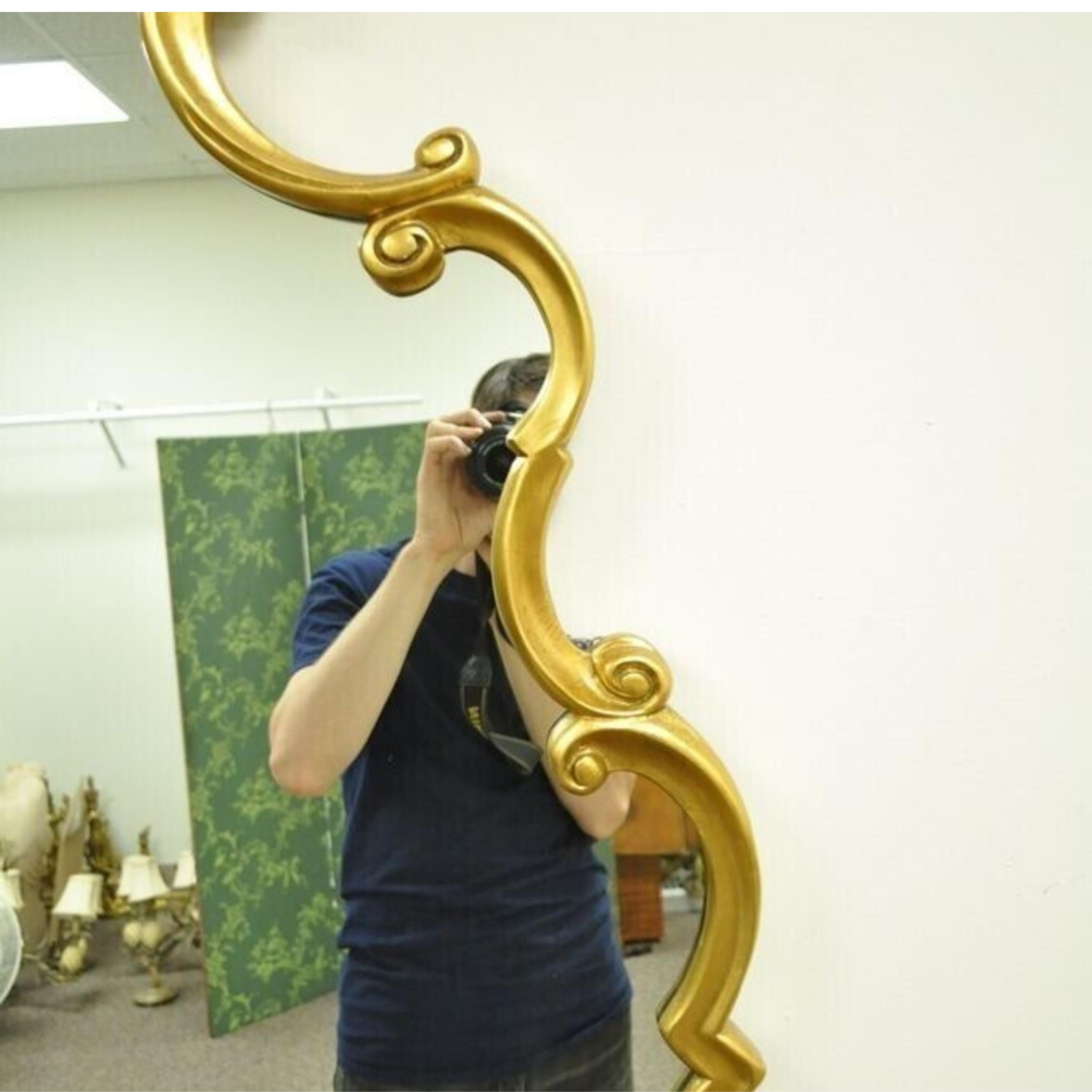 Vintage Hollywood Regency French Style Gold Carved Wood Scrollwork Wall Mirror For Sale 1