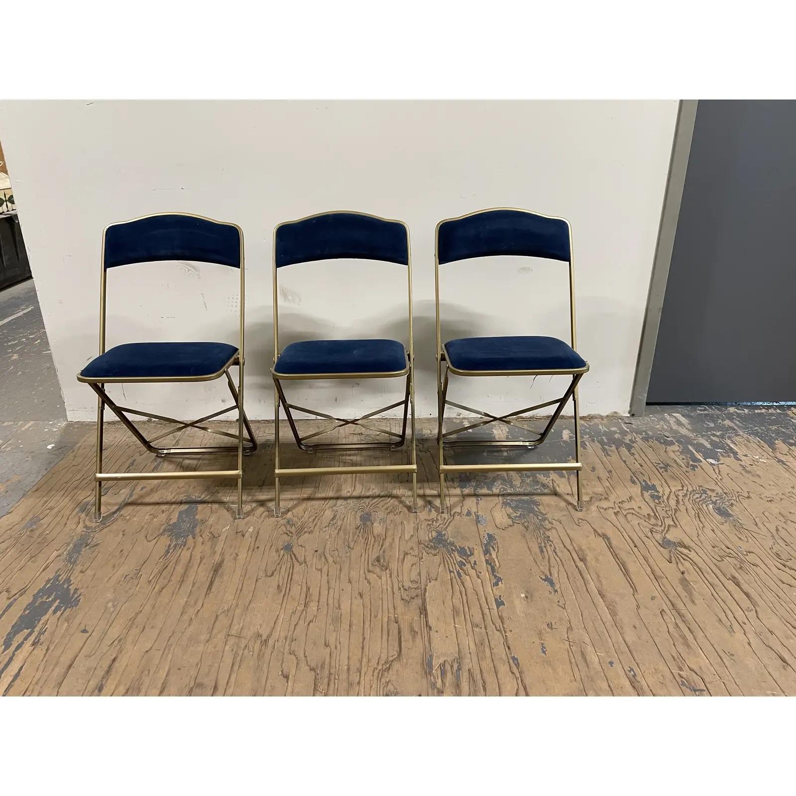 Set of 3 vintage metal and mohair folding chairs by Fritz & Co.

Slim gold frame with Blue velvet upholstery.

In EXCELLENT condition 