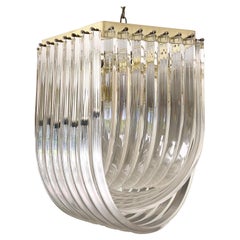 Vintage Hollywood Regency Gold Lucite Ribbon Lucite Chandelier