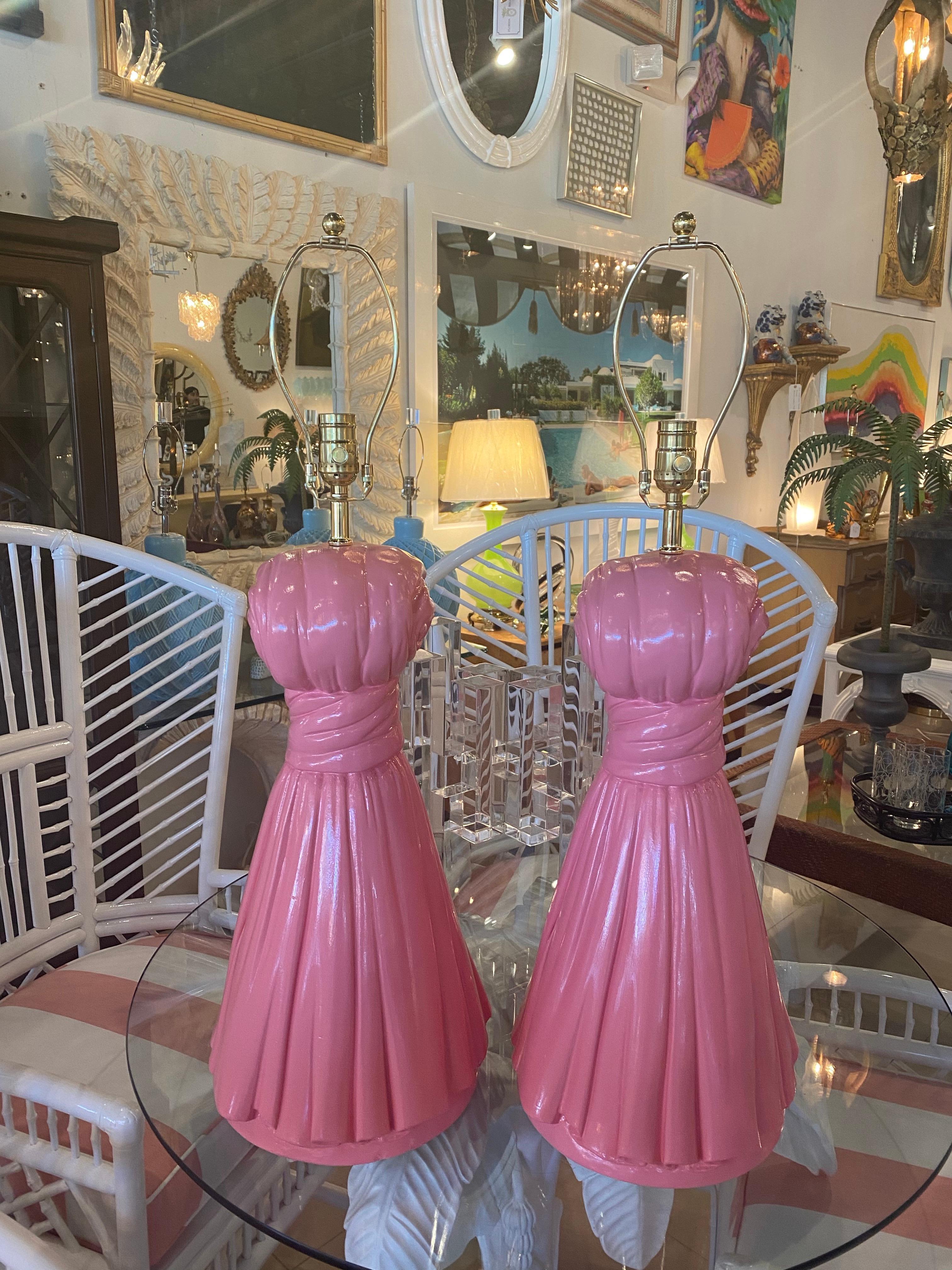 Lovely pair of coral pink plaster tassel tassle table lamps. These have been newly wired and have all new brass hardware. 
Measures: Height to finial 31
