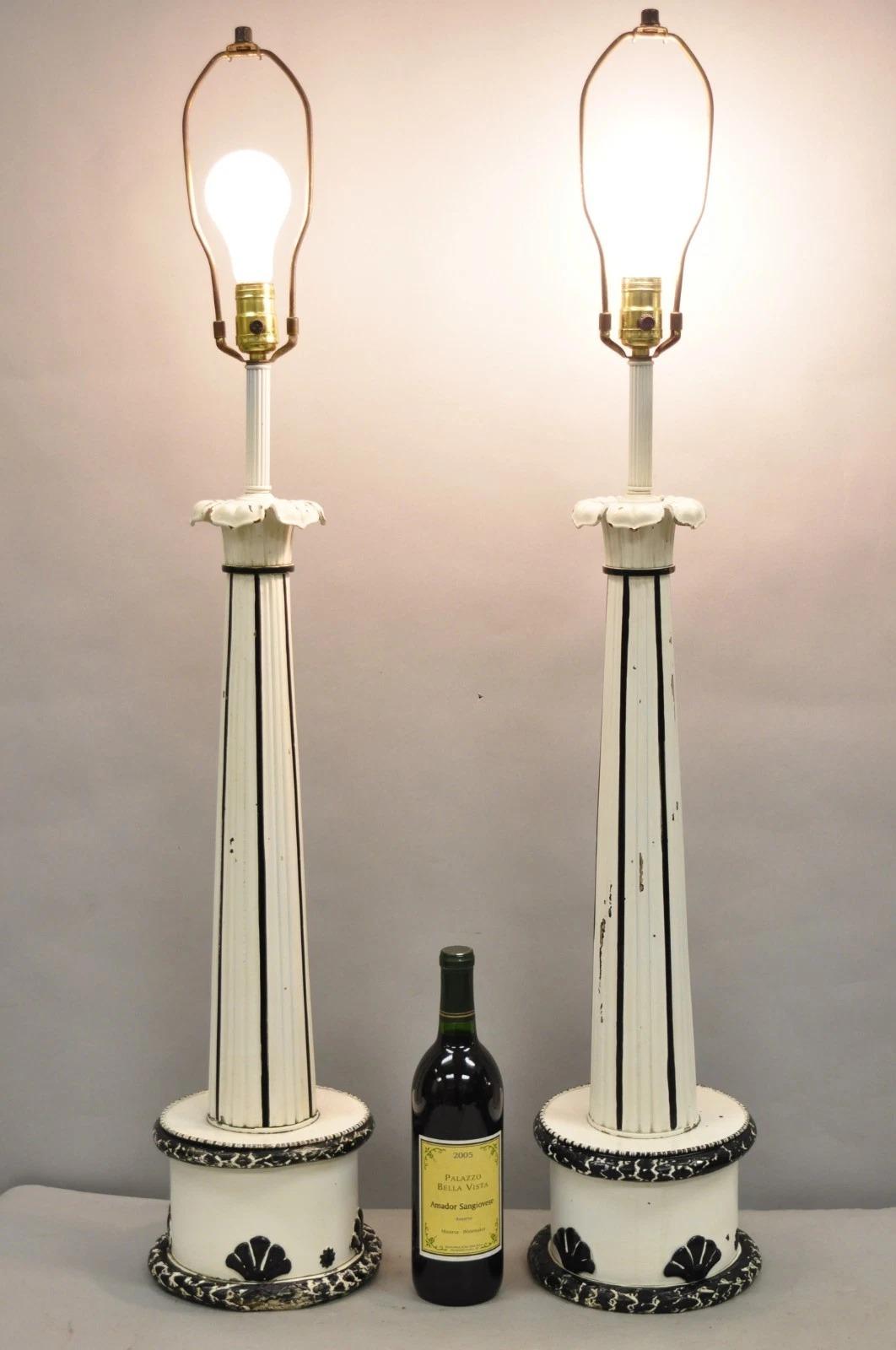 Vintage Hollywood Regency Tall Lotus Leaf Black & White Painted Metal Column Form Table Lamps - a Pair. Circa Mid 20th Century. Measurements: 41