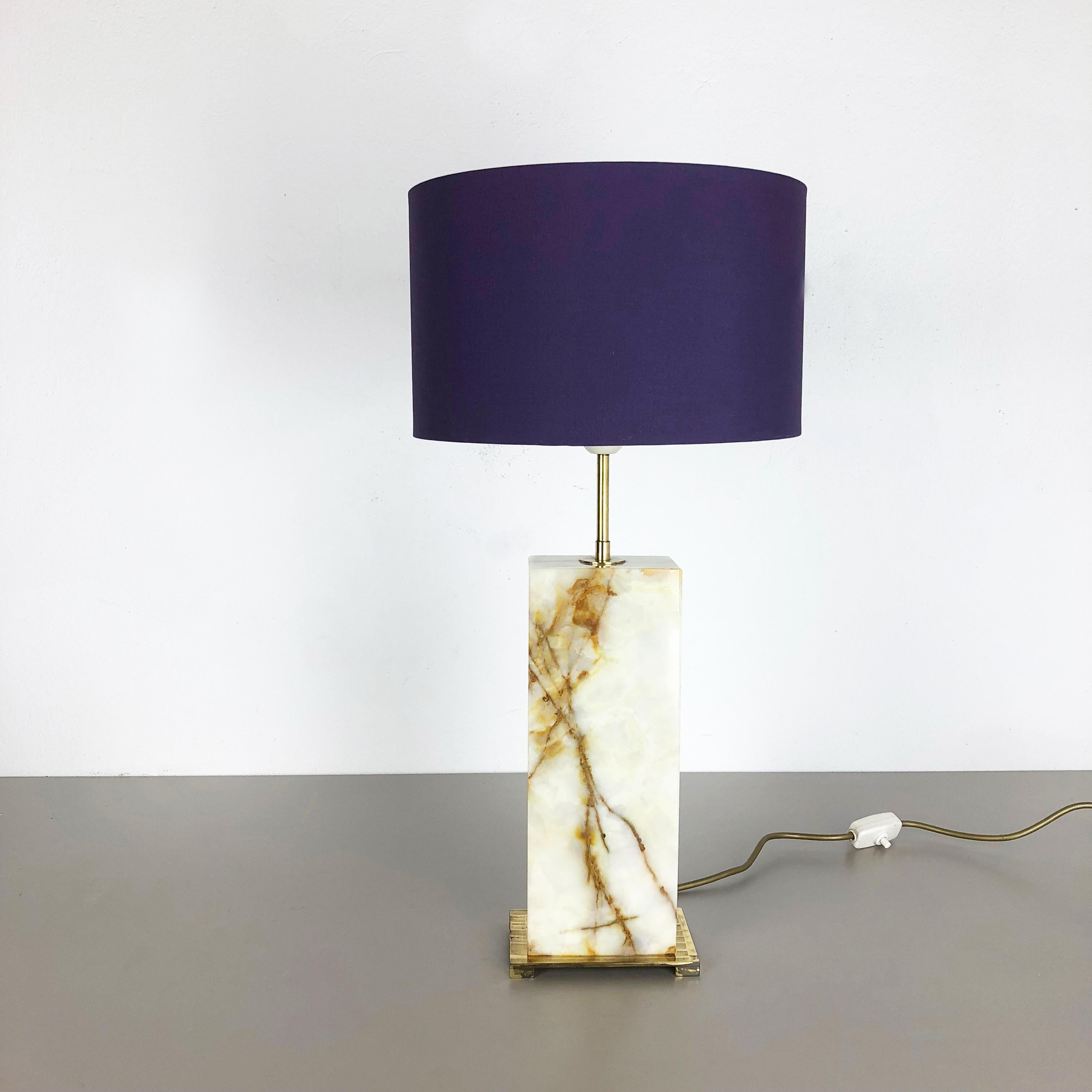 Article:

Impressive large onyx marble light base stand


Origin:

Italy


Decade:

1960s





This original vintage light base element is made of high quality onyx marble standing on a nice shaped brass element. The origin of this
