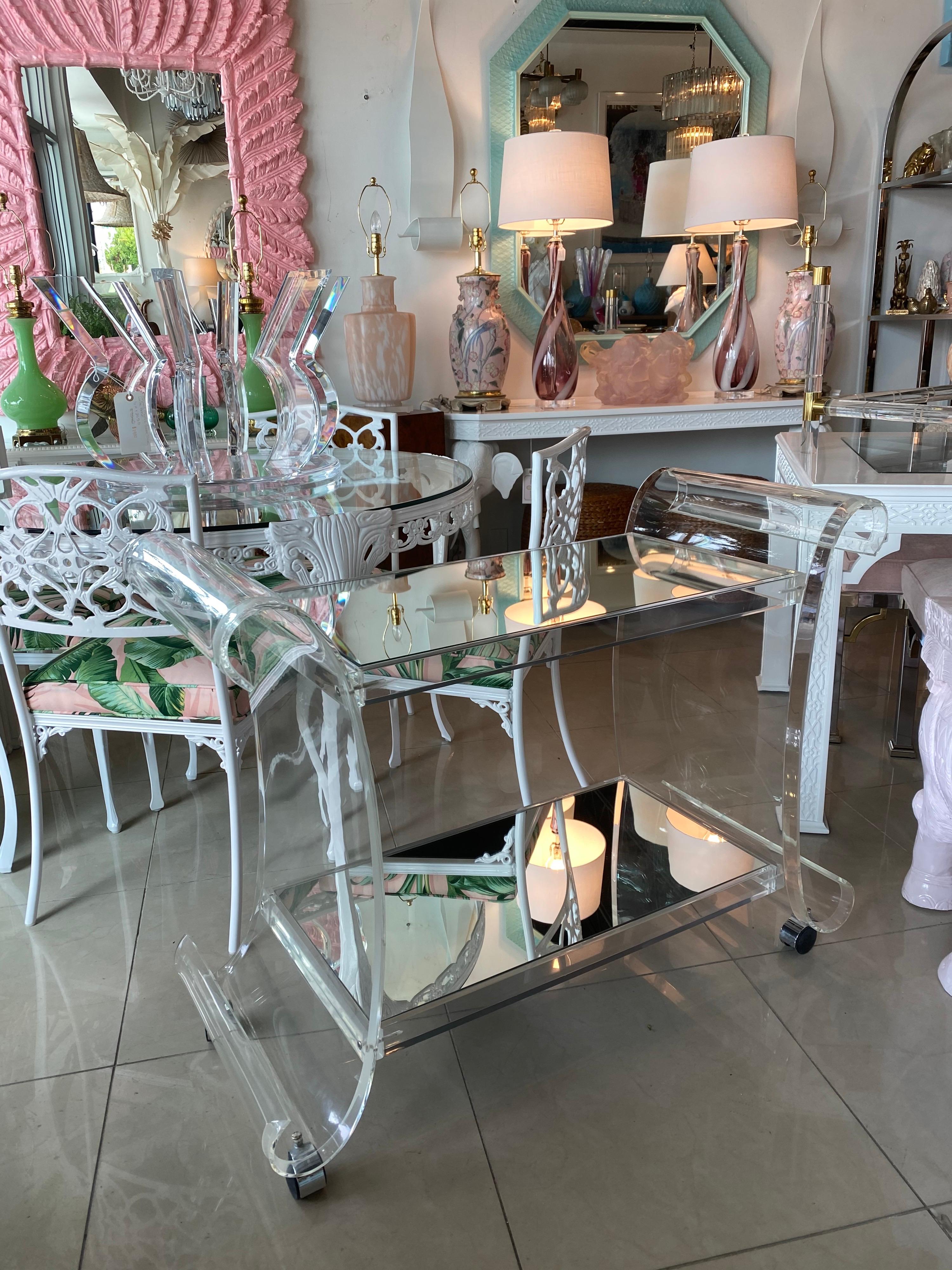 Lovely vintage lucite bar cart. This has been professionally polished. I will replace the original mirrors with either new mirrors or new glass, your choice. I love the curvy sides on this cart!