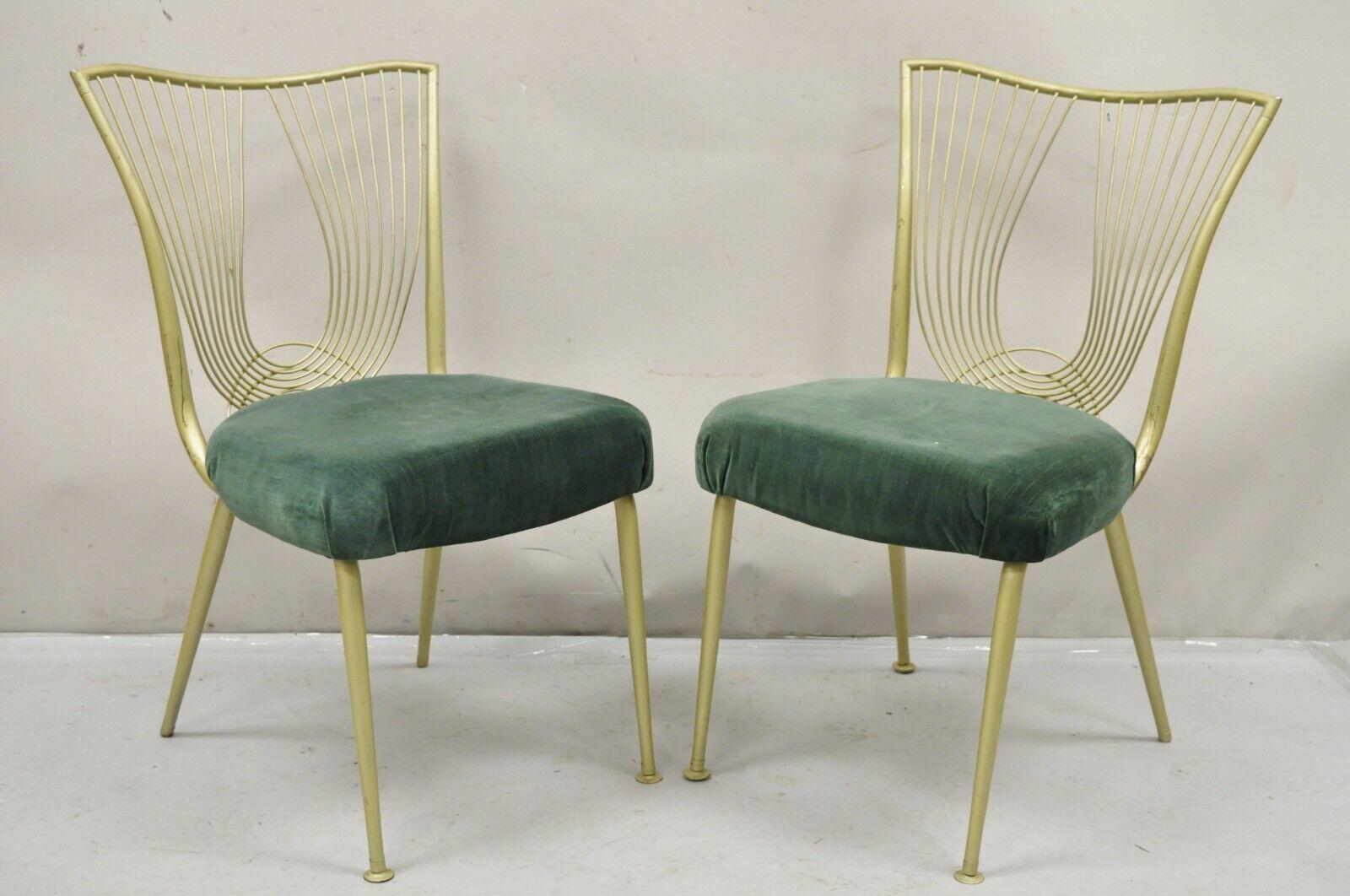 Vintage Hollywood Regency Sculptural Metal Brass Tone Kitchen Dining Chairs by Virtue Bros. Mfg - Set of 4. Item features sculptural metal frames, gold/ brass painted finish, original label, unique vintage set. Circa  Mid 20th Century. Measurements: