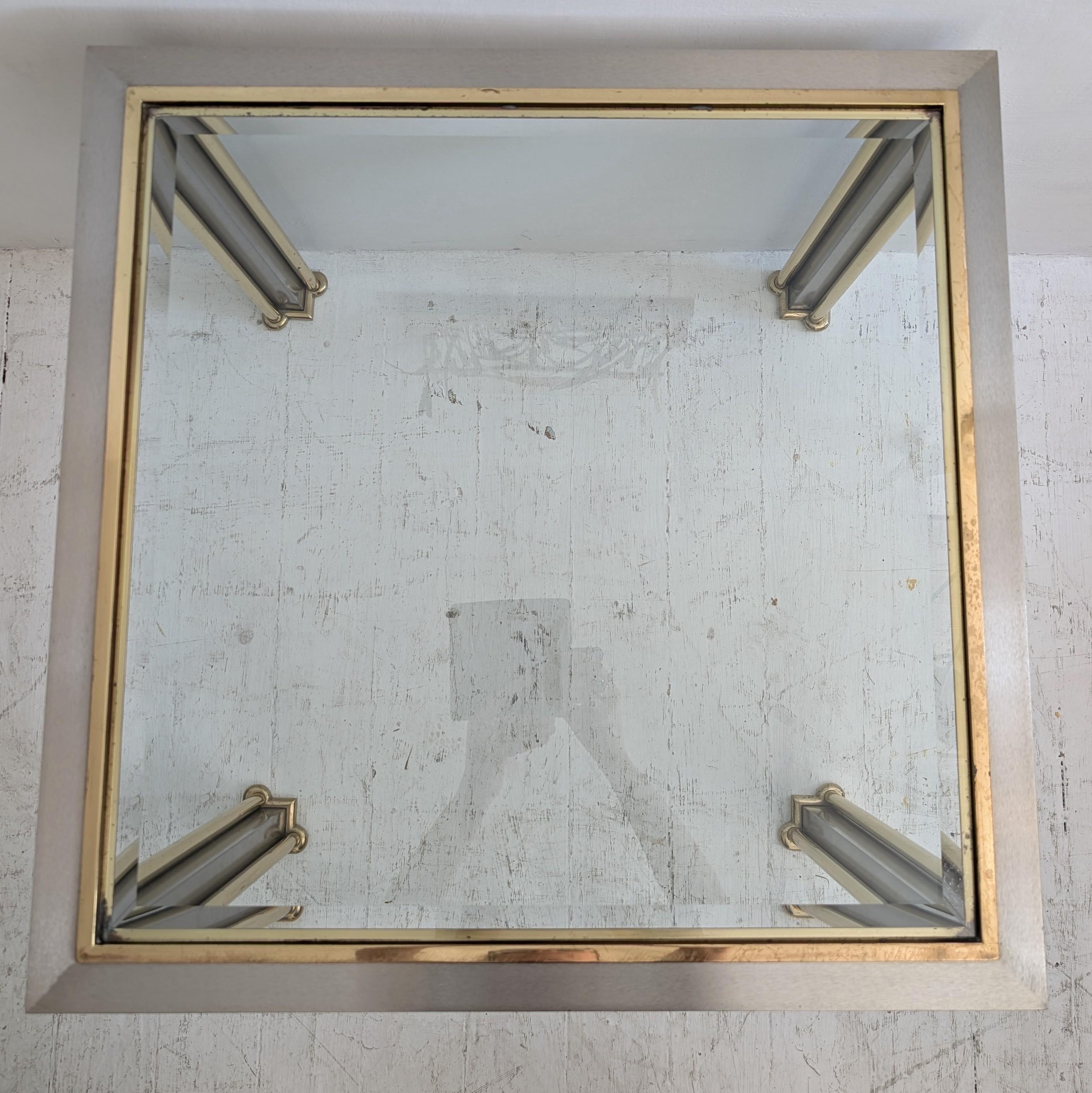 Mesa auxiliar o de centro vintage Hollywood Regency de acero y latón con cabezas de cisne años 70 en venta 1