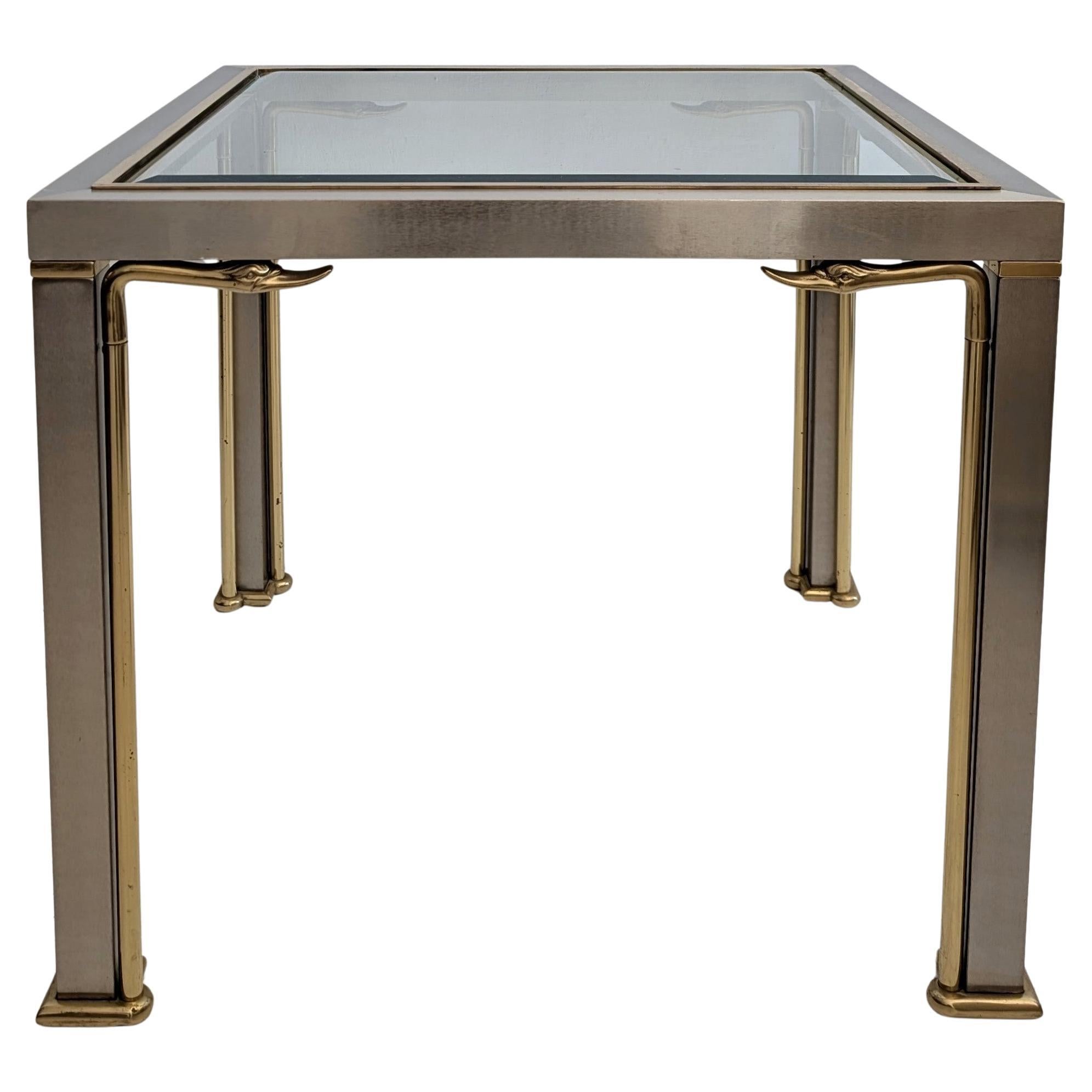 Mesa auxiliar o de centro vintage Hollywood Regency de acero y latón con cabezas de cisne años 70
