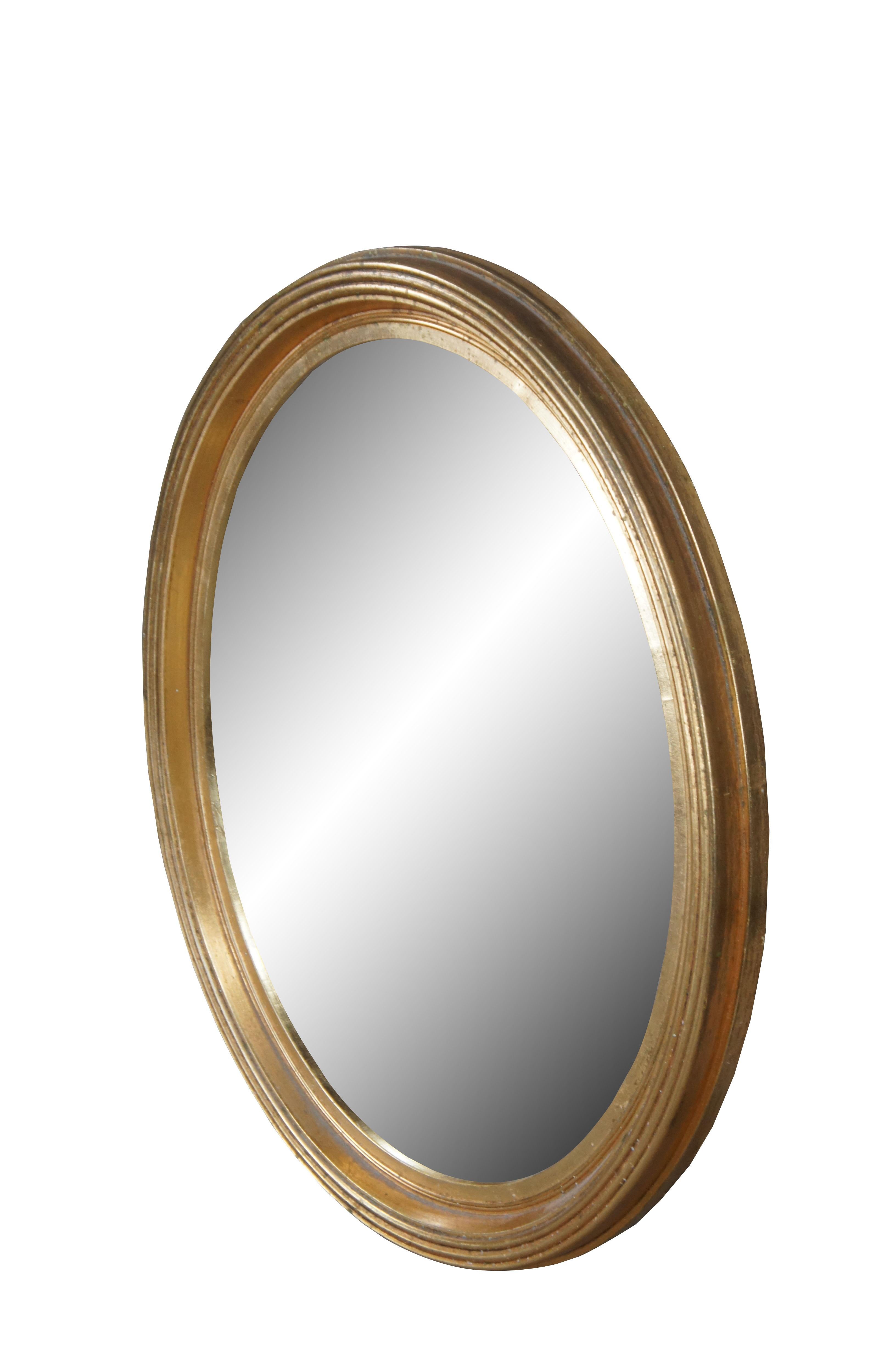 Vintage Hollywood Regency Style Gold Oval Wall Hanging Vanity Bathroom Mirror In Good Condition In Dayton, OH