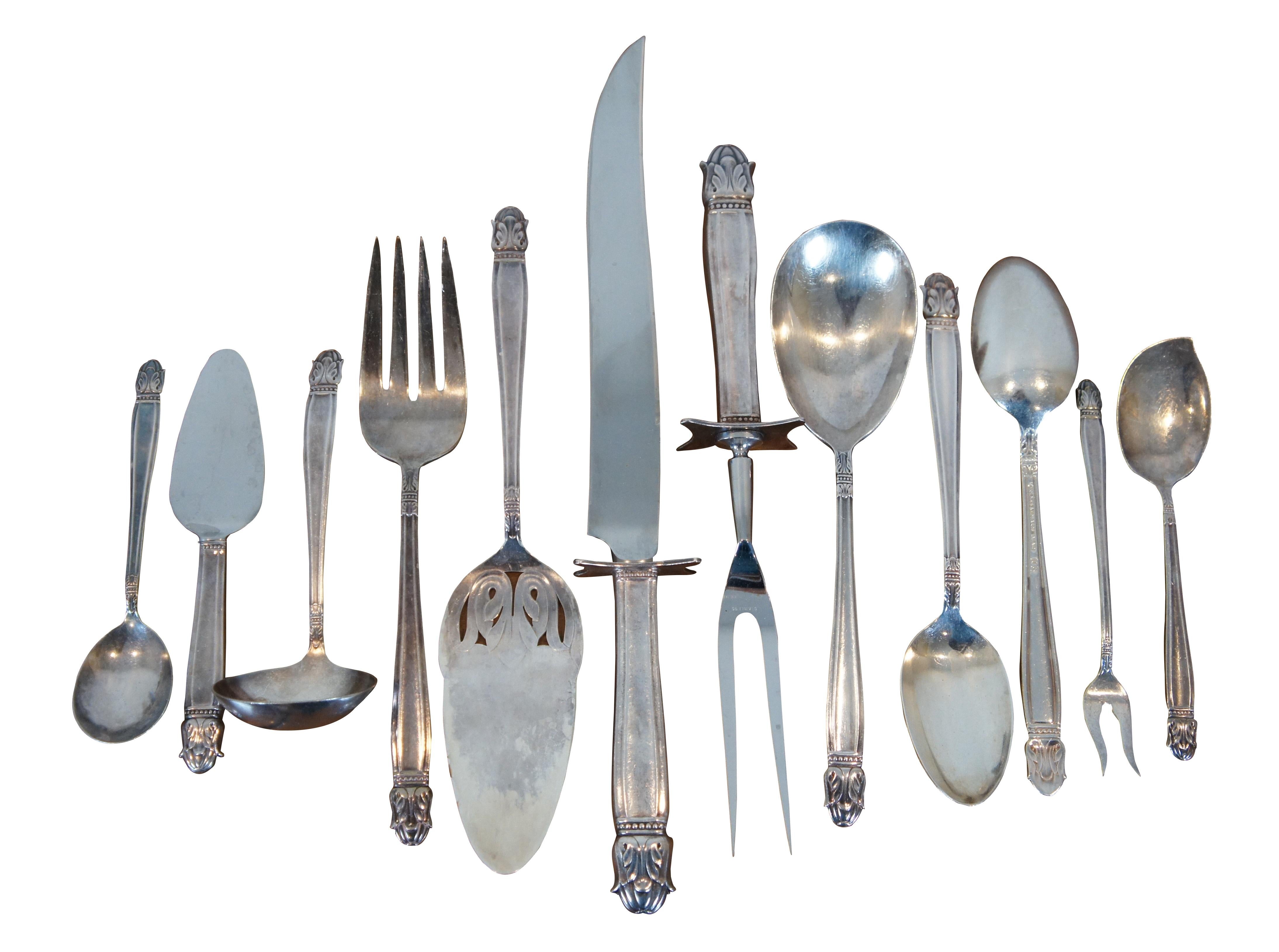 Pattern: Danish Princess, first introduced 1938. This vintage set includes: Carving knife & fork, pie server, casserole spoon, serving fork, 2 serving spoons, gravy ladle, berry spoon, cheese spreader, sugar spoon, shrimp fork, 12 table forks, 12