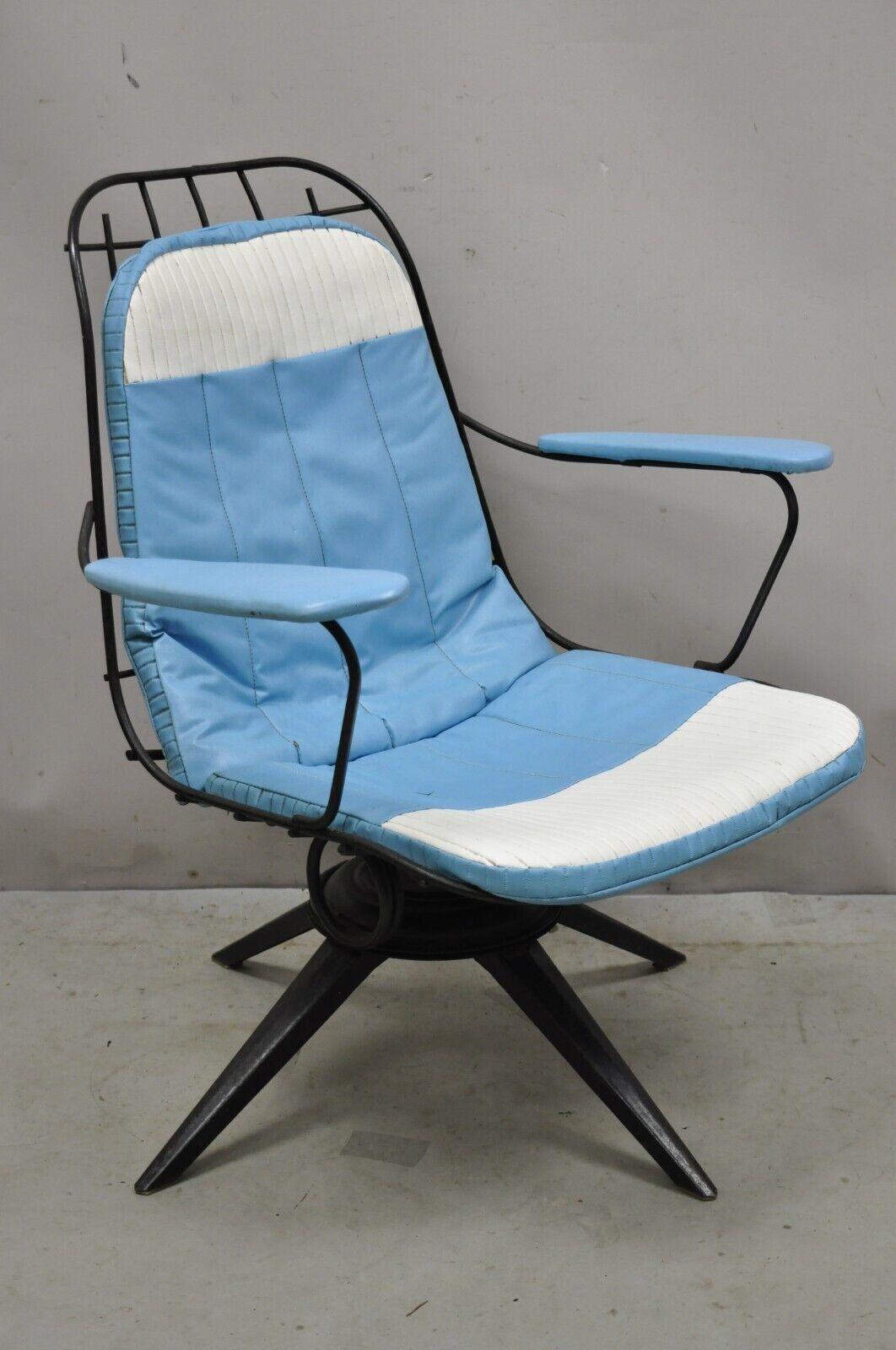 Vintage Homecrest B-25 Headliner Swivel Lounge Chair w/ Original Blue Cushion. Item features Original blue and white vinyl seat cushion, swivel base, metal frame, upholstered armrests, original label, very nice vintage item. Mid-20th Century.